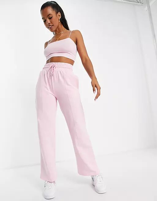 ASOS DESIGN straight leg sweatpants with deep waistband and pintuck in organic cotton in baby pin... | ASOS (Global)