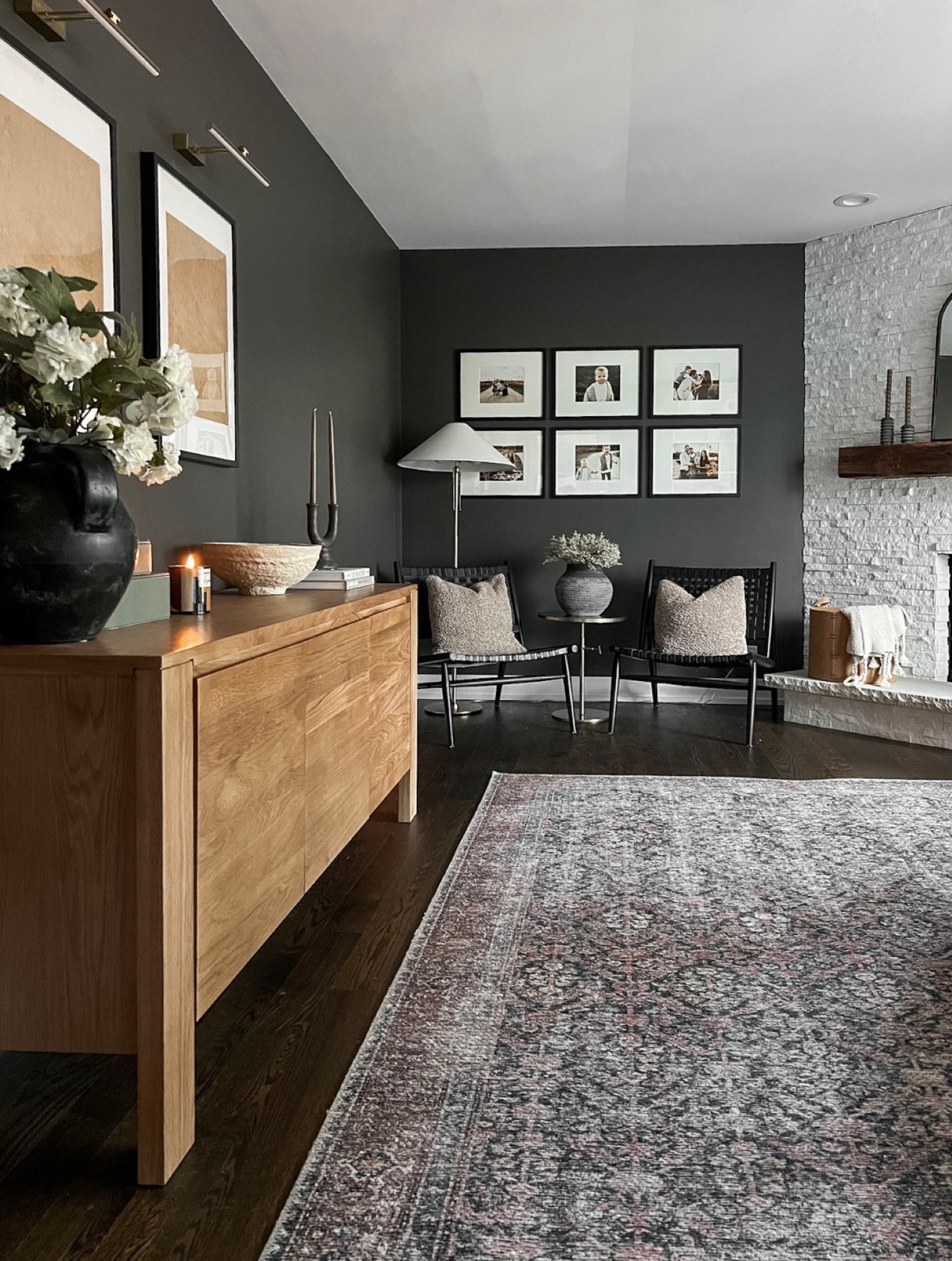 Moody living room / sitting room. We had this extra space off our kitchen so we turned it into an elevated playroom that we could also enjoy! This area rug is by Loloi and on major sale right now at Wayfair for the end of the year! 

#LTKstyletip #LTKsalealert #LTKhome