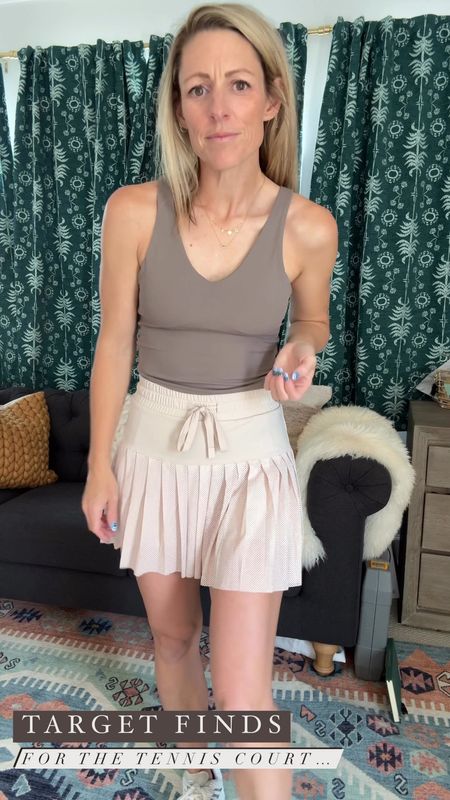 An airy breathable pleated tennis skirt for the court.  Also loving this ribbed athletic top for the gym.

#tennisoutfit #tennis #activeskirt #tennisskirt #targetstyle

#LTKVideo #LTKFindsUnder50 #LTKActive