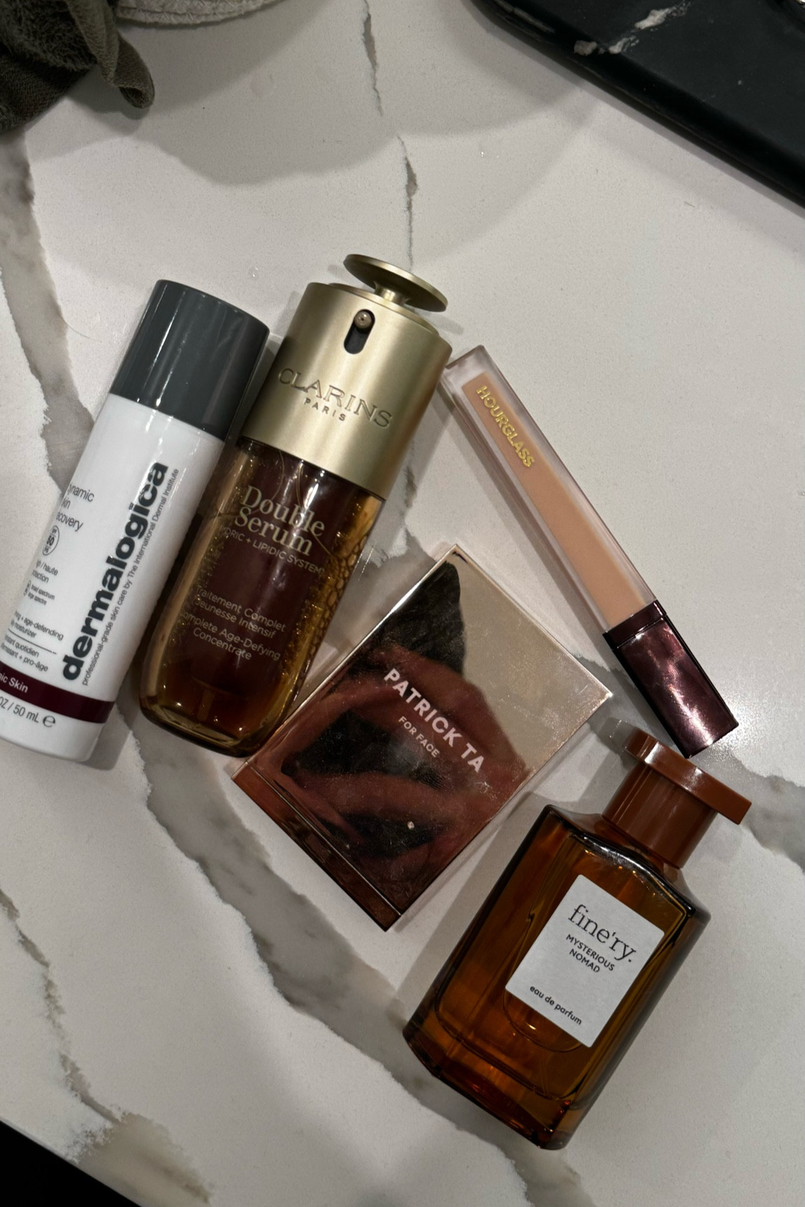 Dermalogica - SPF
Clarins - double serum 
Concealer - pearl / shade 4
Patrick ta - oh she’s different 
Perfume - exact linked 