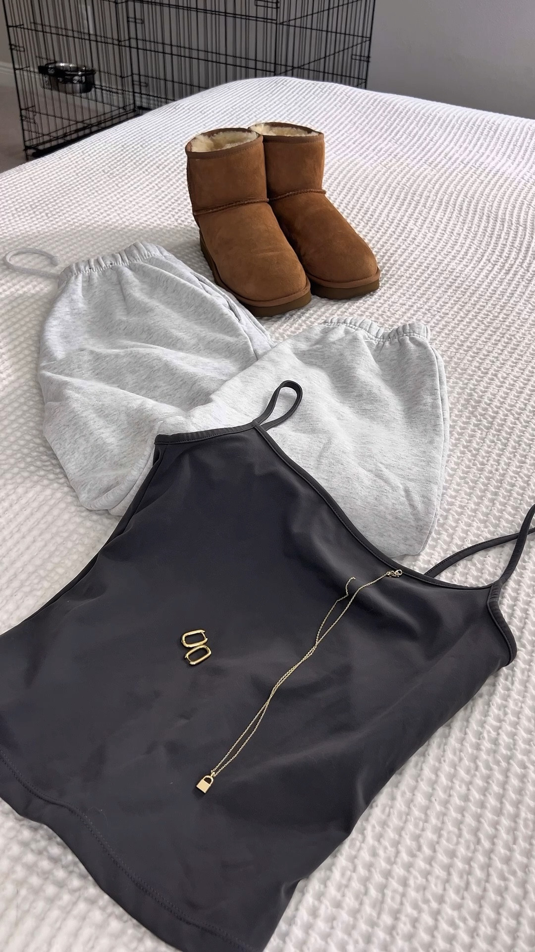 Laid back layers and golden details ✨
A cozy combo of soft grey sweats, a dark charcoal tank, gold jewelry, and a uggs 🤎 perfect for slow mornings or coffee runs in comfort and style ☕️
#CozyVibes #FallOutfitInspo #NeutralStyle #OffDutyLook #LoungewearGoals #EffortlessStyle #WeekendUniform #ChicAndComfy

#LTKautumn #LTKStyleTip #LTKShoeCrush