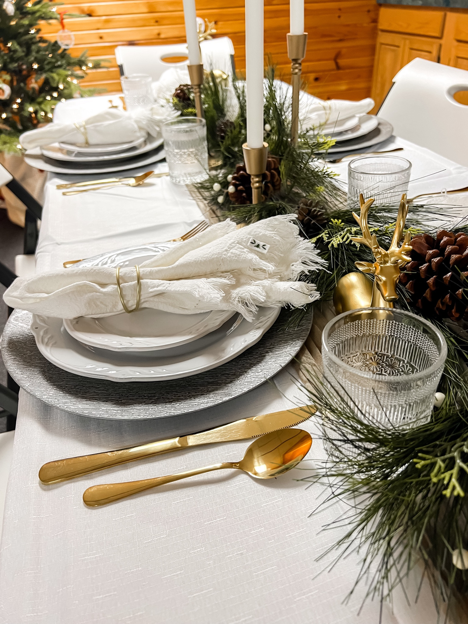 Christmas table setting decor 

Gold silverware, table decor, table scale, Christmas decor, Christmas dining, Christmas dish ware, Christmas dinnerware, Christmas cocktails 

#LTKhome #LTKHoliday #LTKSeasonal