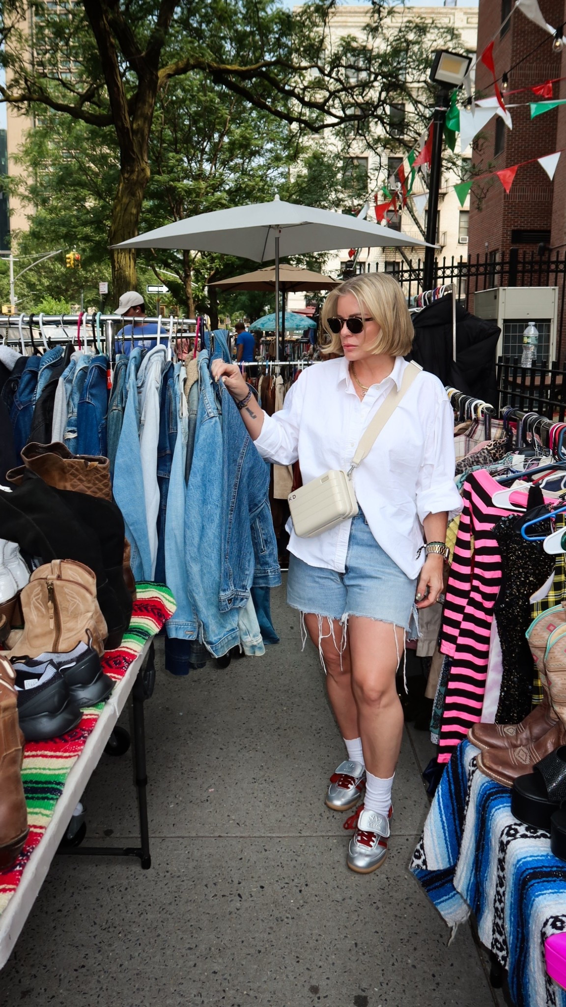 A simple white button down paired with vintage cutoffs and metallic sneakers/ easy summer outfit! 

#LTKOver40 #LTKStyleTip #LTKSummerEdit