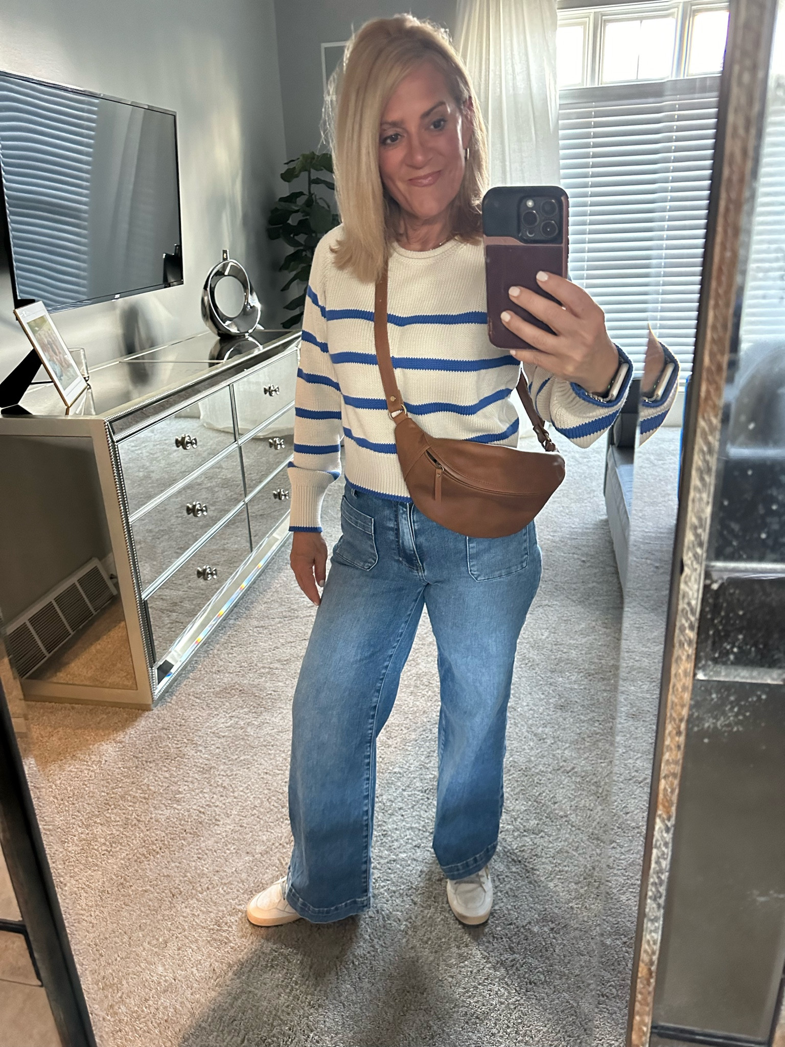 Loving this striped sweater and denim look for Spring.  So perfect for cooler days where you want to feel like SPRING!

#LTKfindsunder100 #LTKover40