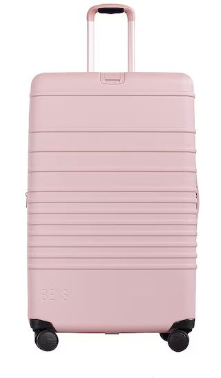 The Large Check-In Roller in Atlas Pink | Revolve Clothing (Global)
