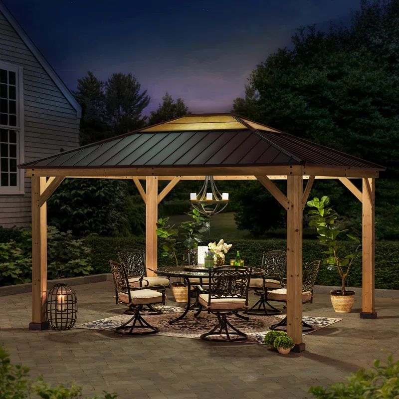 Grayden 11 ft. D x 13 ft. W Patio Cedar Framed Gazebo with Brown Steel and Polycarbonate Hip Roof | Wayfair North America
