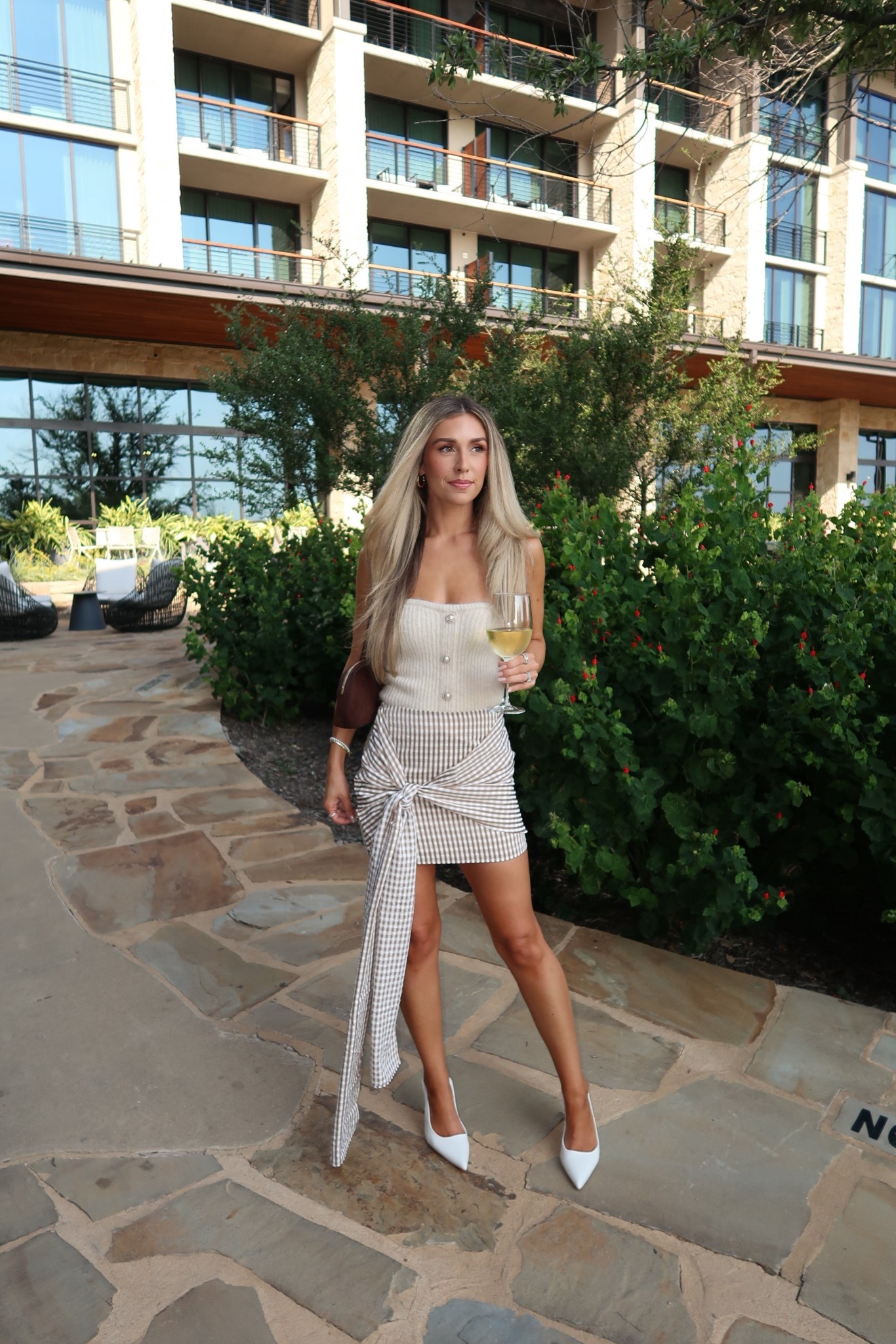 Outfit from day 1 of LTK Con 
+ strapless sweater top has a matching cardigan - xs 
+ checkered wrap skirt: xs 
+ white pointed toe heel: true to size and actually comfortable 
+ brown bag is a recent target find and under $30!

#LTKCon #LTKSeasonal #LTKFindsUnder50