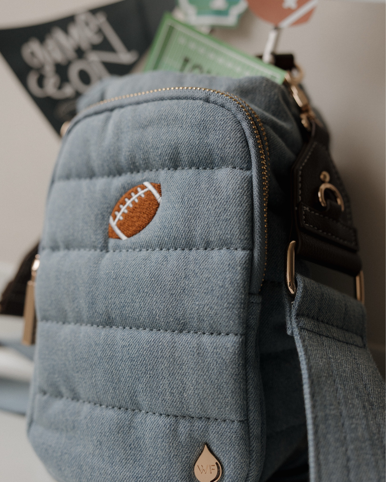 #ad The ultimate gift for the football loving girlies 🏈
How cute is this denim & gold Wanderfull bag!?!? The perfect bag that fits it all!Need a gift for the football fanatic in your life, Wanderfull has 2 options:Light Denim
Football Embroidered HANDLET™ or Clear Stadium HydroBag® styled with your favorite teams colors tassels! @wanderfullbrand #WanderFullGiftGuide #WanderFullBrand
#HolidayGiftGuide shop products linked here & visit Wanderfull to find more styles for all the special people in your life! 

#LTKGiftGuide #LTKHoliday #LTKSeasonal