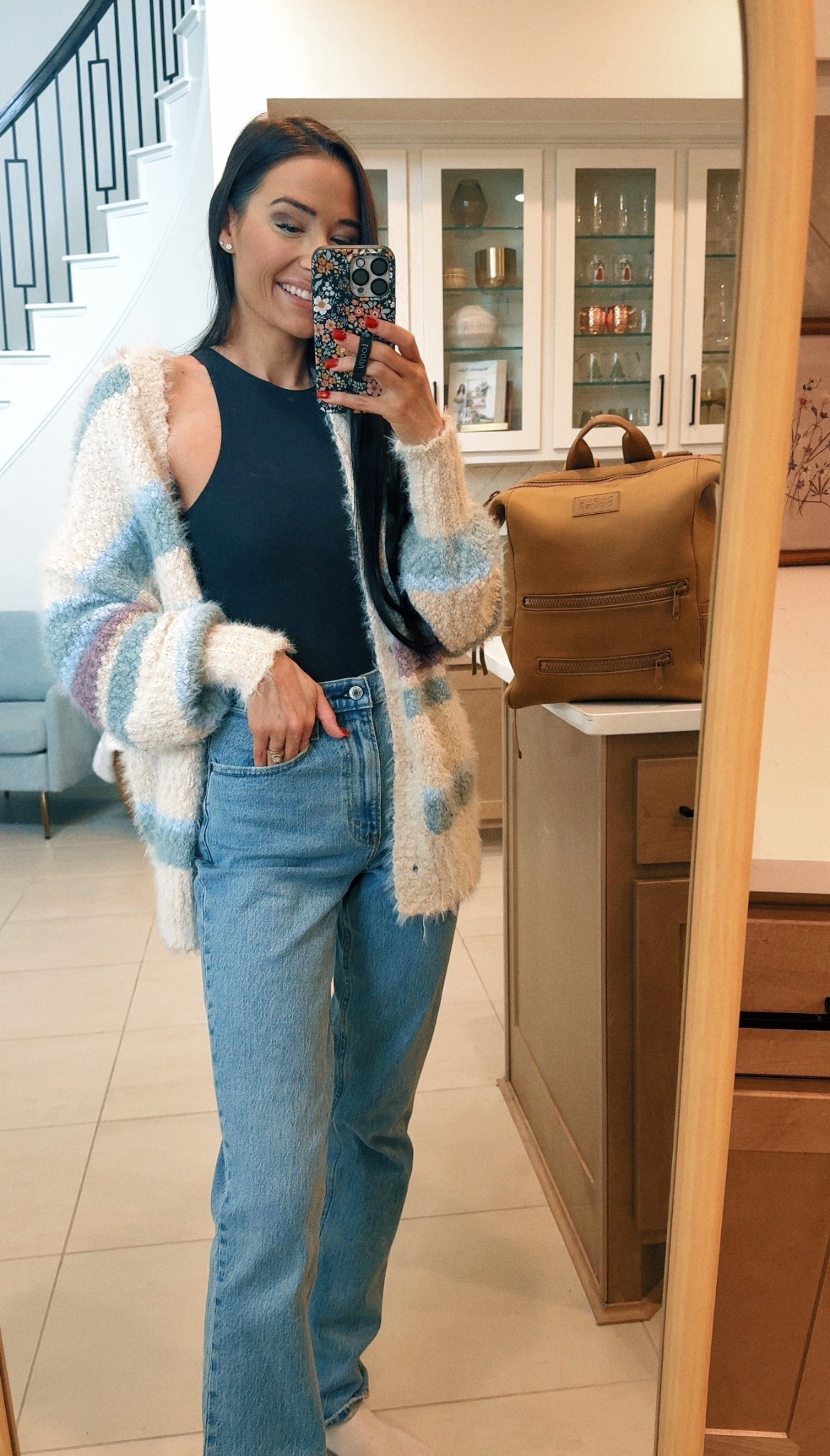 OOTD for chasing 3 babies out and about today! Jeans are super cute and cozy, cardigan is perfect for a pop of color and body suit is my go to skims! Diaper bag is my holy grail!! 

#LTKdayinmylife #LTKootd #LTKmomlife