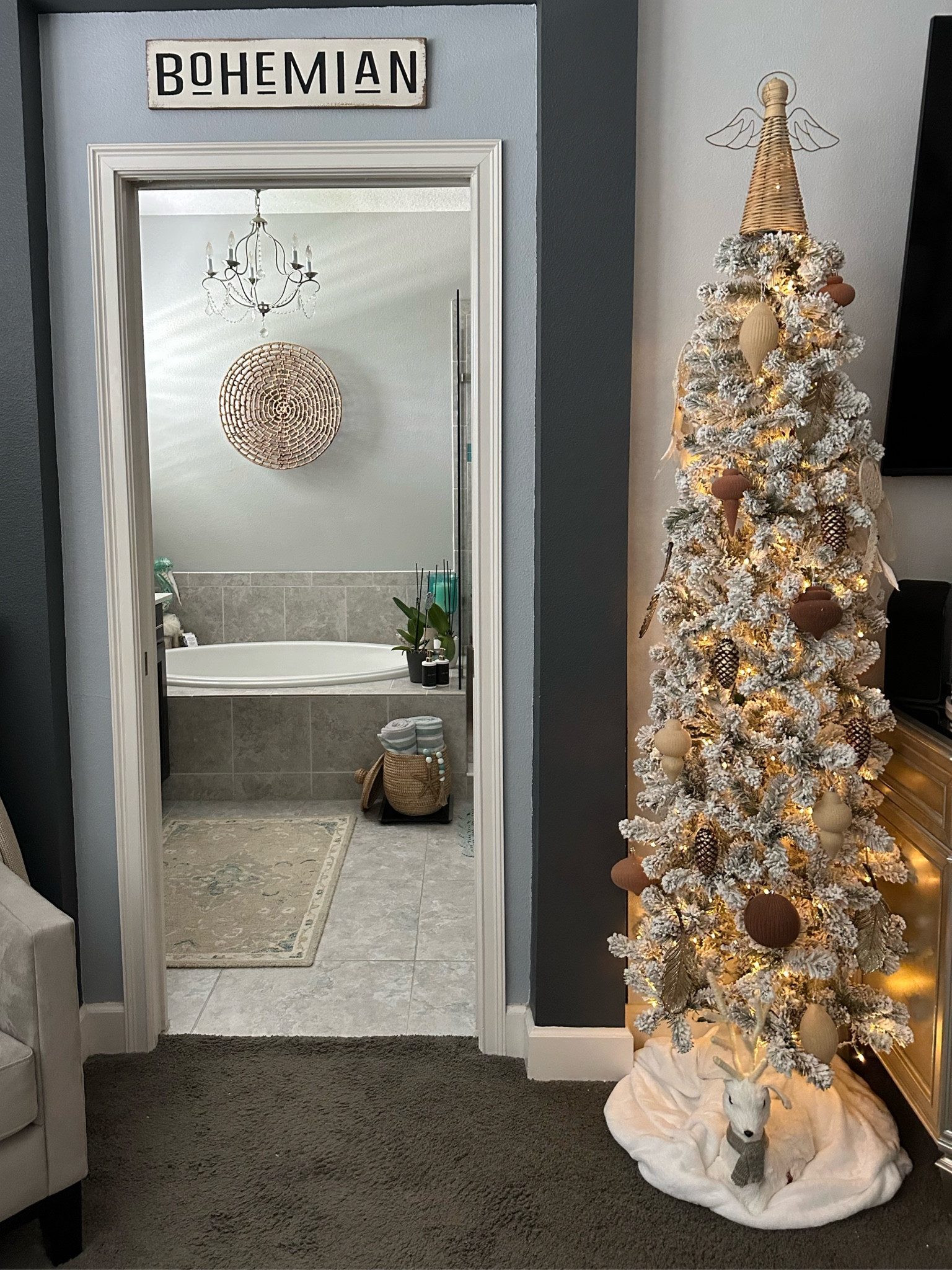 Love our master bedroom tree it’s a flocked prince 7 ft tree pencil with warm led lights. I used neutral decor I had already and some boho stuff like dream catchers feathers and a rattan angel topper /#kingofchristmas #christmastree #christmasornaments #treeskirt #blankettreeskirt #rattantreetopper #bohemianchristnastree #neutralornaments #flockedornornaments 

#LTKSeasonal #LTKHoliday #LTKHome