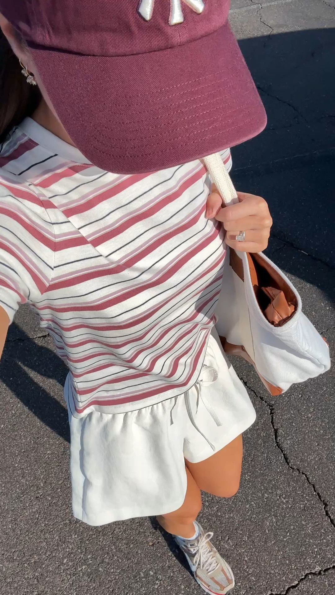 I am 5’7” wearing size XS in the striped tshirt and small in the shorts!