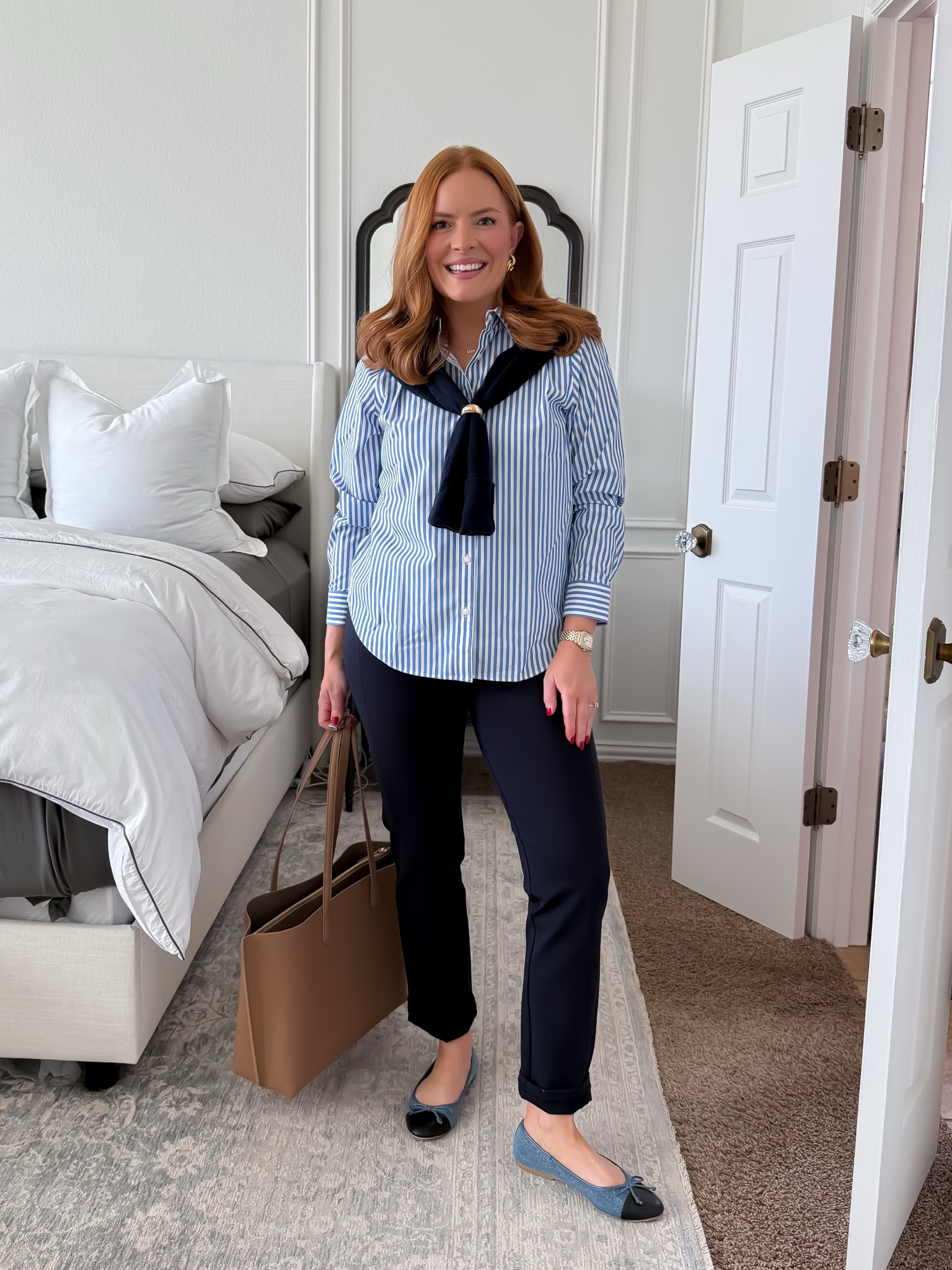 Classic corporate workwear outfit for client meetings or presentation days.

This striped button down + tailored navy trousers combo is my go-to when I need to look polished but effortless. Finished with neutral flats and a structured work tote.

Sizing:
Shirt – wearing size S (true to size)
Trousers – wearing size small (TTS, great length with flats)
Flats – TTS

Perfect for: corporate office outfits, business professional days, consulting meetings, teacher workwear.

#workwearforwomen #corporateoutfit #businessprofessional #officeoutfitideas #capsulewardrobe #workingmomstyle

#LTKootd #LTKdayinmylife #LTKWorkwear