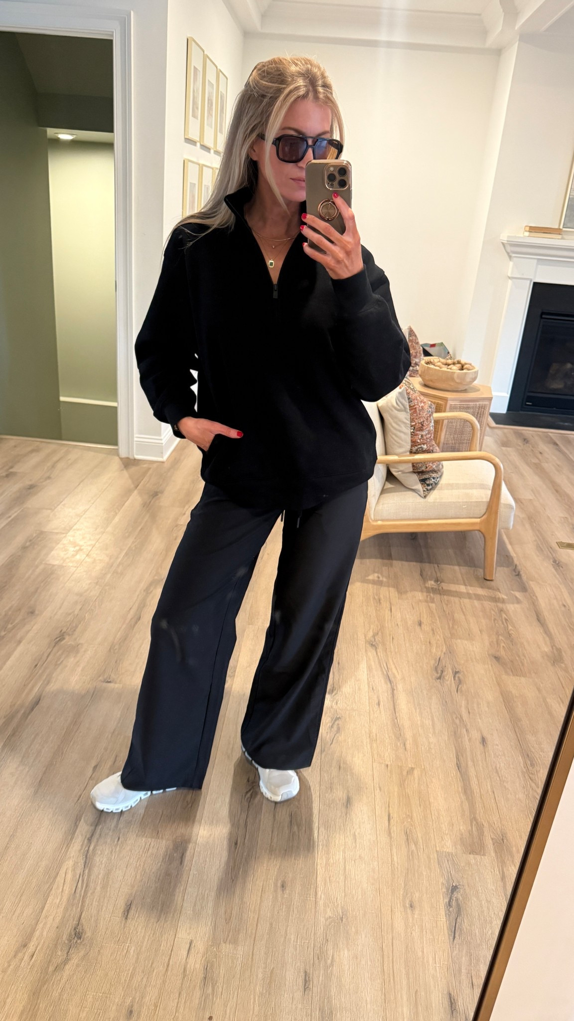 Love this all black look for a night walk. 
Black half zip sweatshirt: this is my picky Girl sweatshirt, just with no hood and a half zip. Wearing a small, runs slightly oversized.
Wide leg active pants: FANTASTIC. So well designed. Runs TTS, wearing a S.
Running shoes: runs TTs 


#LTKStyleTip #LTKTravel #LTKActive