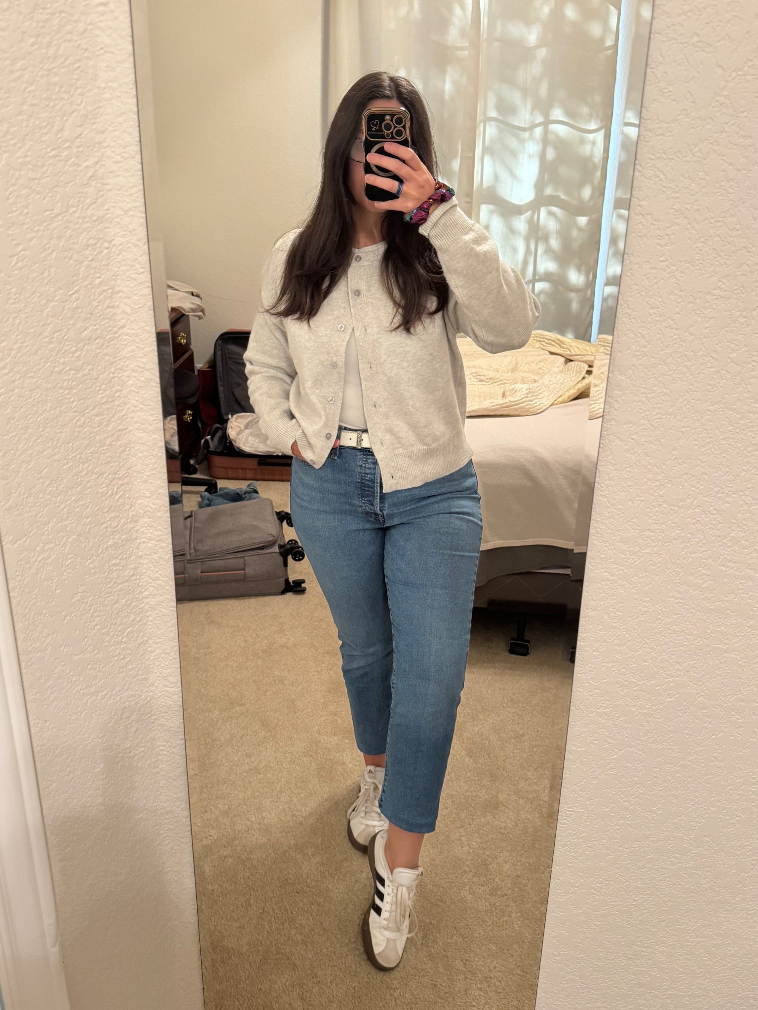 A casual comfy look. I am wearing size 31 in these Levi’s jeans. They’re a great fit. Some stretch. I love this cardigan from Amazon. It’s very soft. I am wearing it in medium. I like to button up the top buttons and leave the rest open. It makes it feel less boxy. 

#LTKootd #LTKMidsize