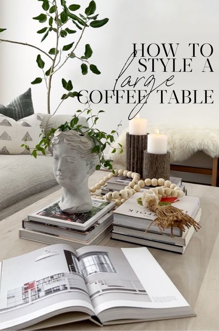 When styling a large coffee table we like to start with stacks of our favorite coffee table books, then top it with neutral decor pieces, plants and candles.

#LTKunder100 #LTKunder50 #LTKhome