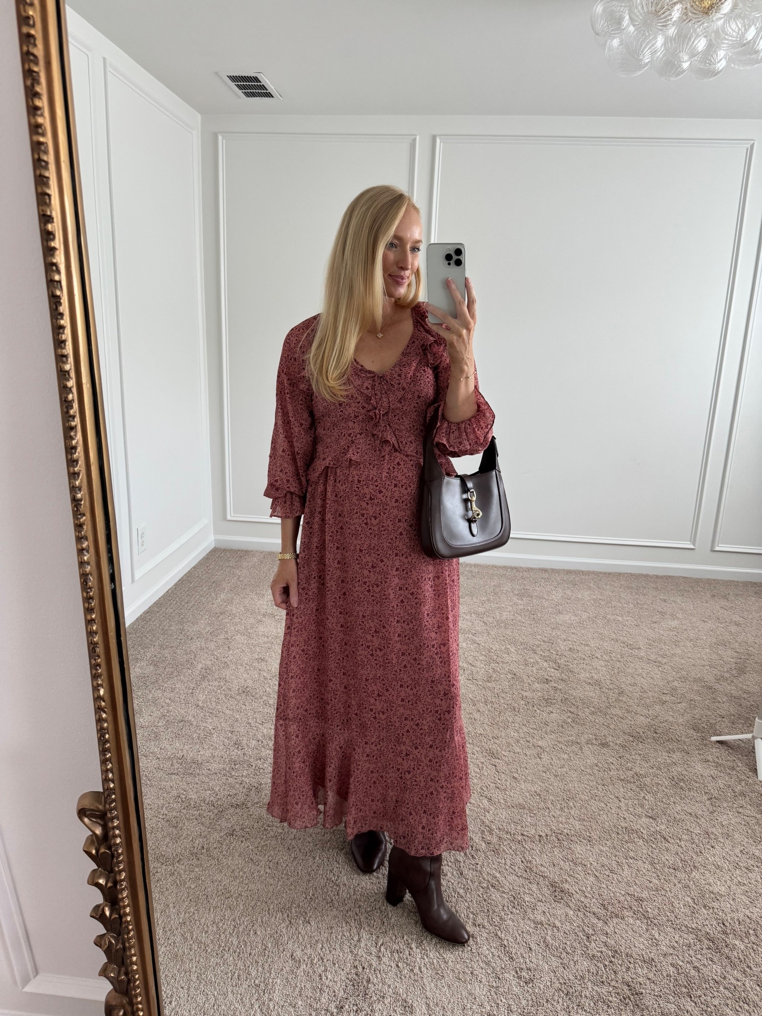 End of summer to fall transitional dress! It’s very bump friendly and comfortable with a removable slip. I’m wearing a size small! Styled with classic knee high boots and a chocolate handbag (it’s designer but I also found a more affordable option I’ll link below!) 

Fall family photos // fall maxi dress // floral maxi dress // loft haul 

#LTKBump #LTKSeasonal #LTKSaleAlert