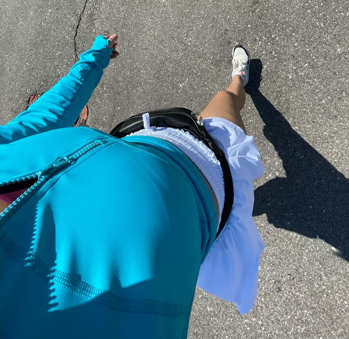 Stylish Woman Walking in Athletic Shorts