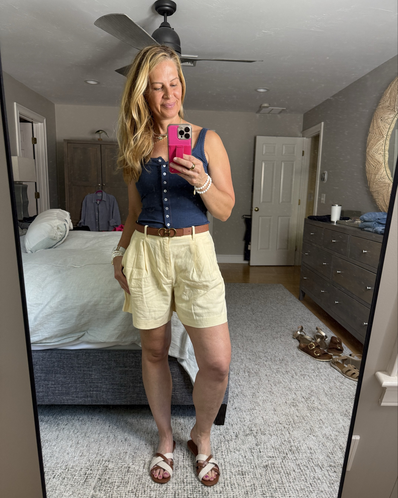 Pairing easy linen shorts with my favorite belt that is reversible and I love the double horseshoe. It’s so classic and chic. I am pairing the shorts with a free People tank that looks incredible unbuttoned on the bottom and a few buttons on the top you could wear this tucked in or out. Pair it with a pair of neutral sandals, and you’re good to goall items run true to size.

#LTKOver40 #LTKStyleTip #LTKSeasonal