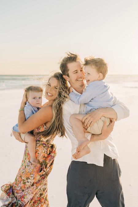 Family beach photos outfit lineup: Mom in a floral midi dress for a pop of color, toddler boys are twinning in their blue button downs from GAP & khaki shorts & Dad rocking his Cozy Earth navy pants with his white linen button down. 

family beach photos | toddler boy fashion | floral midi dress 

#LTKStyleTip #LTKFamily #LTKKids