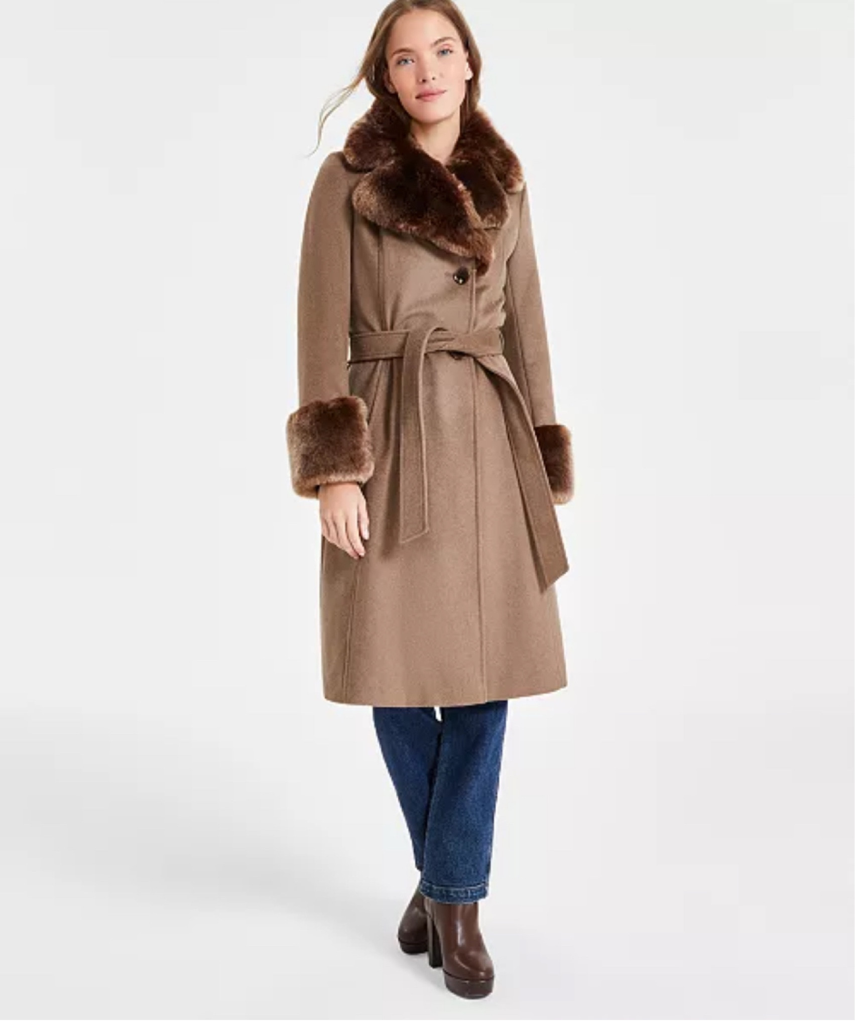 Elegant camel wool-blend coat with faux fur collar and cuffs, belted waist, double-breasted button closure, and a timeless vintage-inspired silhouette—perfect for chic winter layering.

#LTKTravel #LTKSeasonal #LTKMostLoved