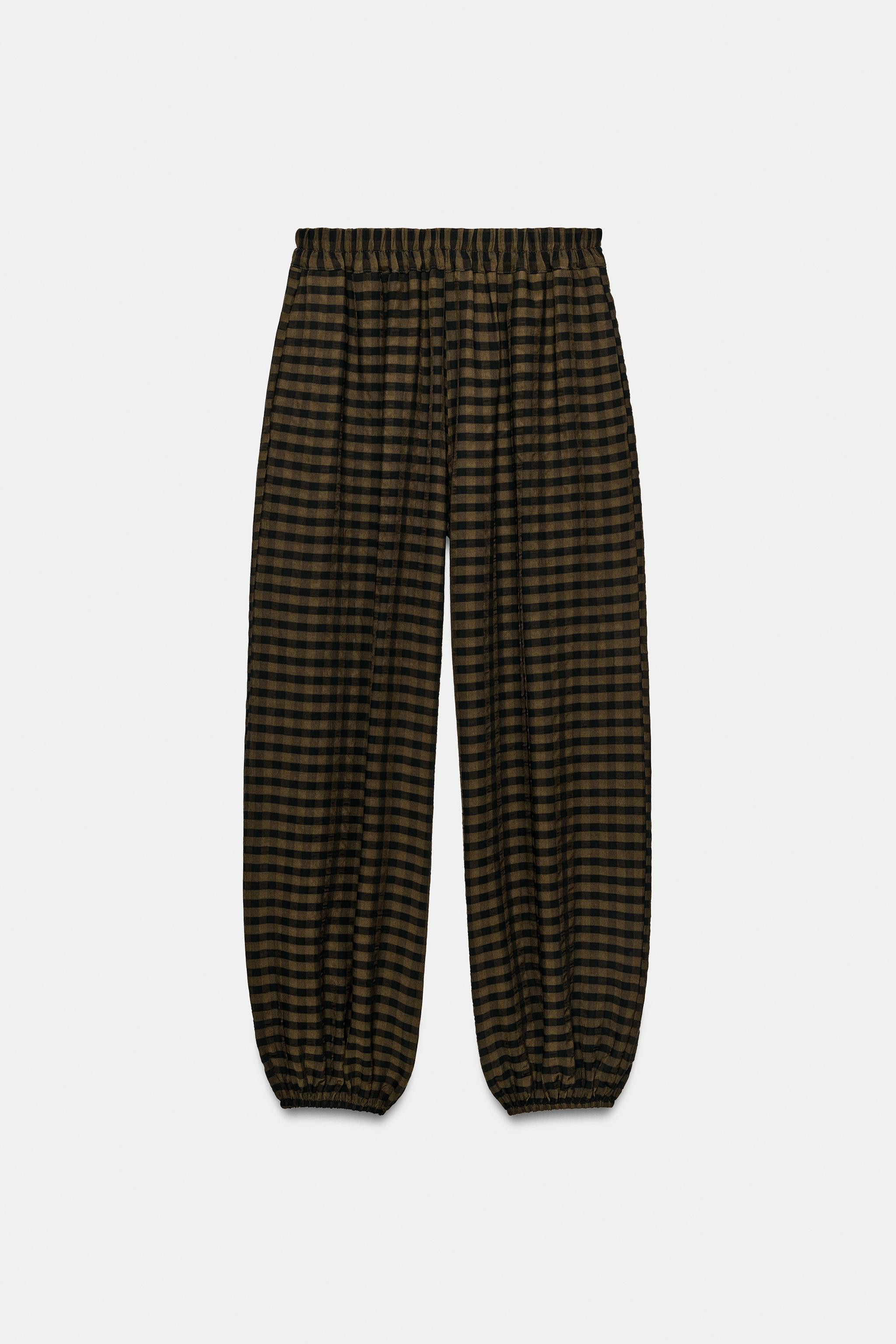 Gr\u00f6\u00dfe des Models: 180 cmHigh-Waist-Hose mit elastischem Bund und vorderen Taschen. Die ... | Zara DE
