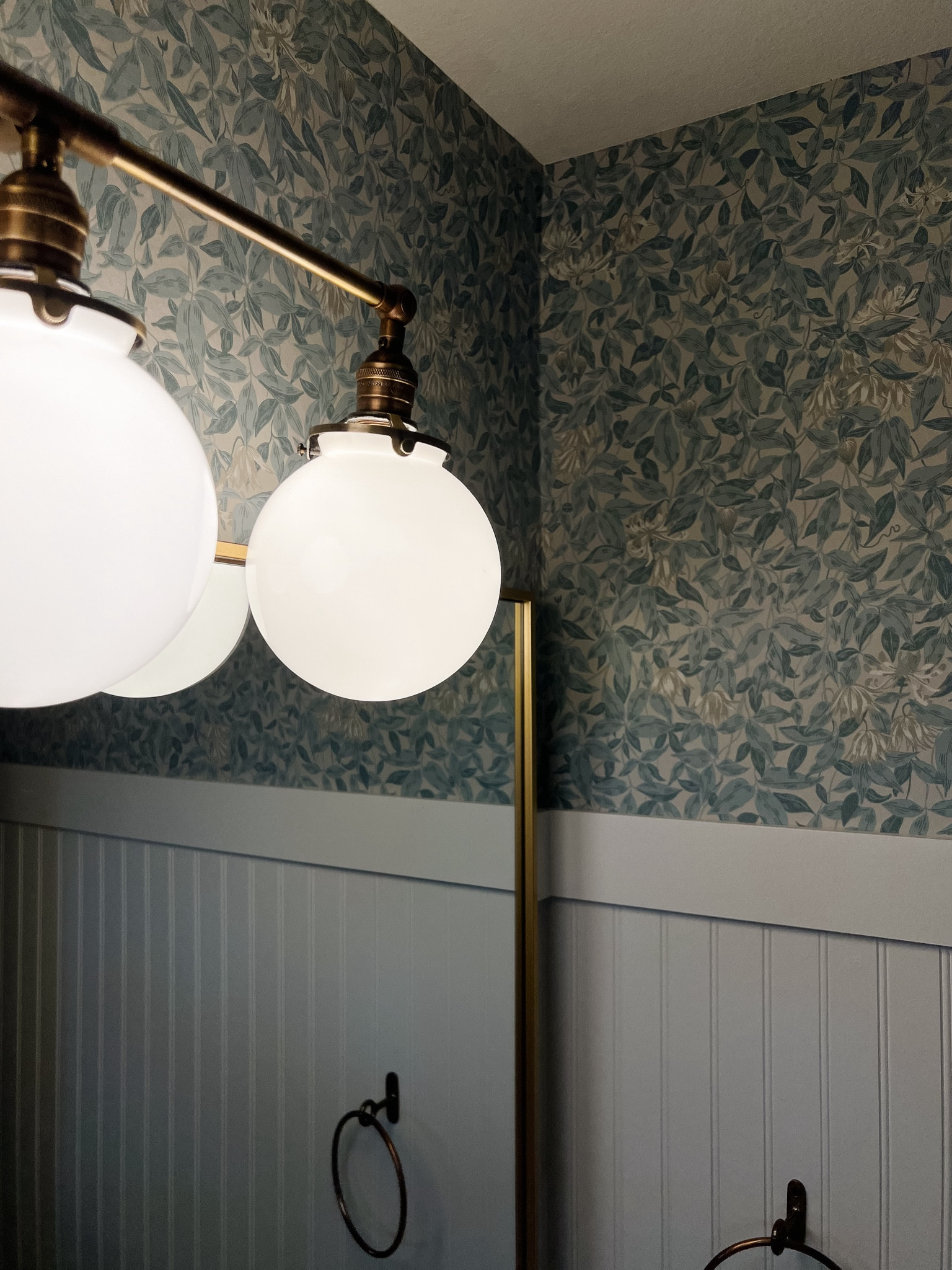 The gorgeous blue floral wallpaper I just put up in Izzy’s bathroom



#LTKHome