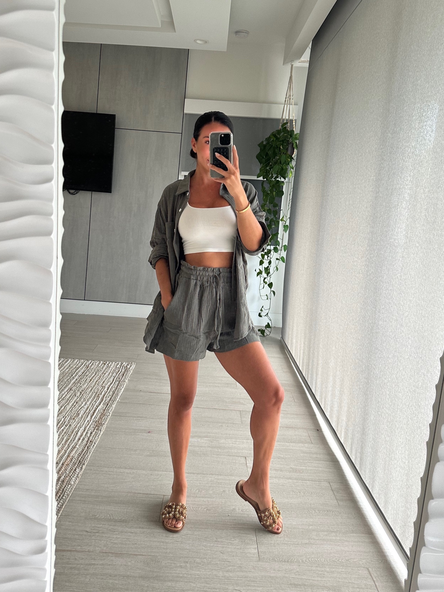 Hey ladies! This a comfy and breathable linen shirt and shorts set from Amazon! I added a white crop so I could wear it open since it’s still so HOT here in south florida! Great for around the house, errands or travel! Comes in multiple colors but I loved the olive for the Fall 🍁 

#LTKtravel #LTKfindsunder100 #LTKfindsunder50