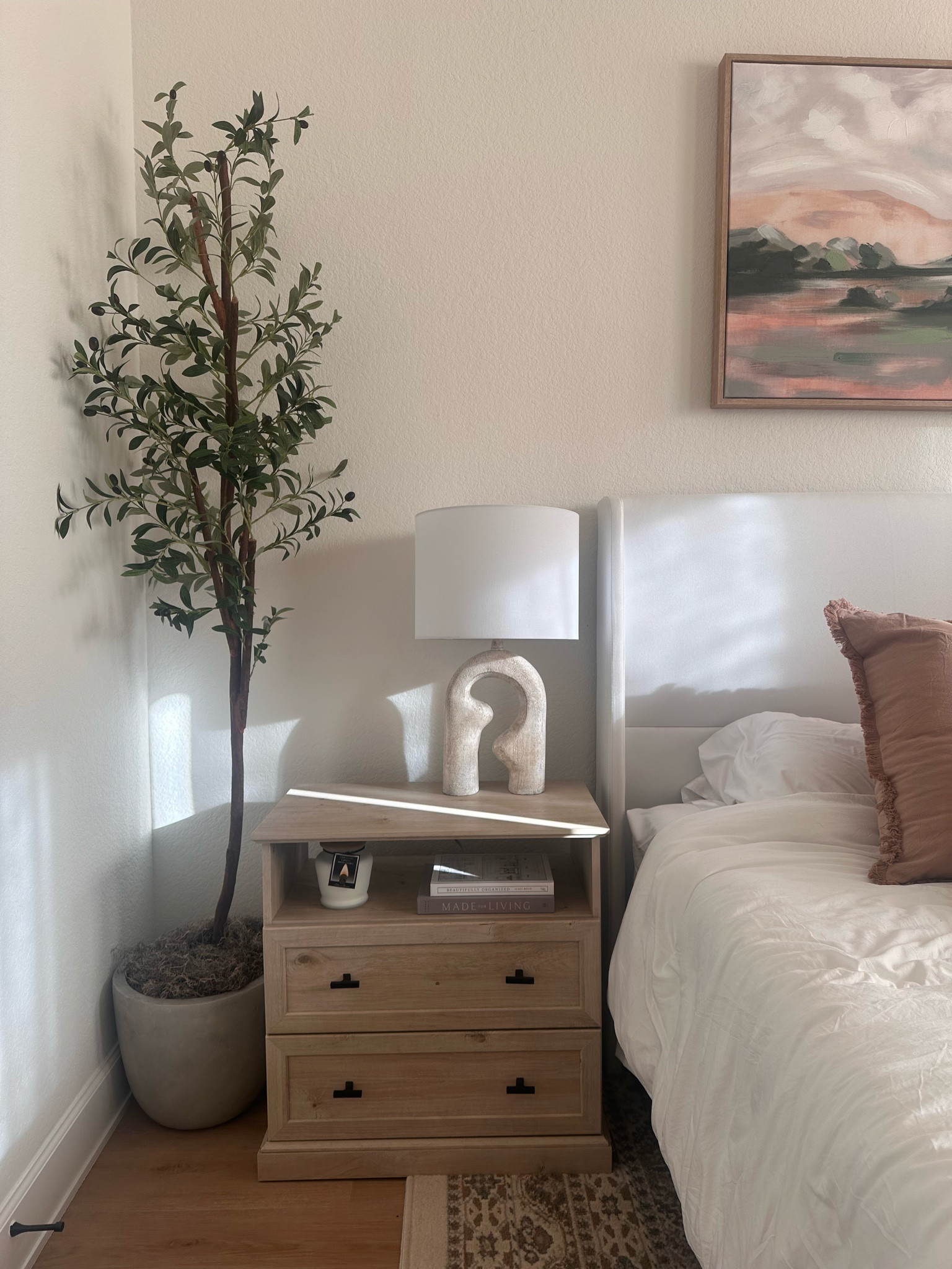 The perfect nightstand for my organic modern aesthetic. Not only is it super cute but it holds a lot!

wooden nightstand, neutral home, earthy aesthetic, olive tree, stone lamp, concrete planter, white bedframe 

#LTKsalealert #LTKhome #LTKstyletip