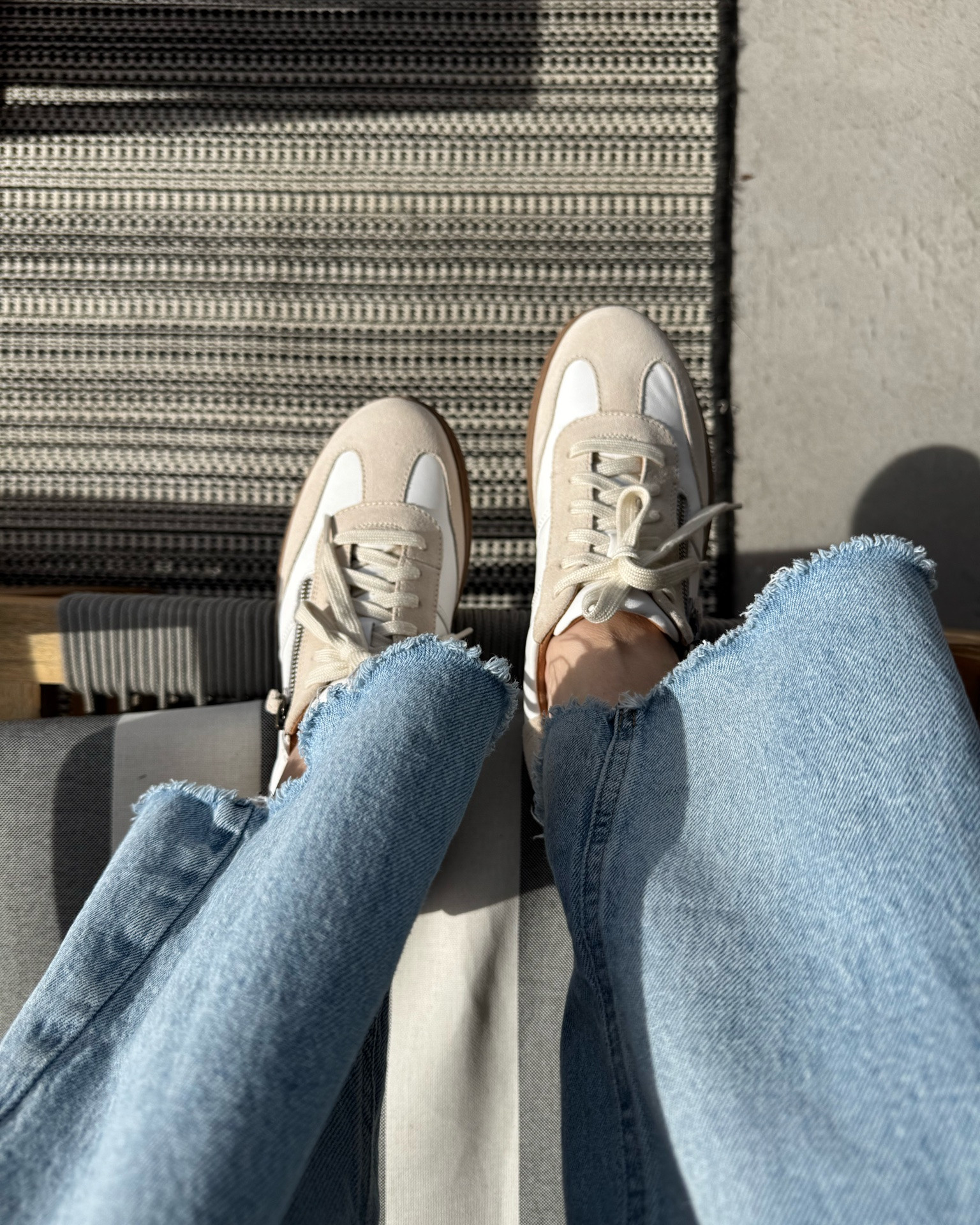 I love a simple white sneaker that's comfortable enough for everyday wear but still feels a little polished.
The side zipper detail is a really nice touch. I can see myself wearing these sneakers out and about with my kids, for travel and work. Plus, they are super comfortable 🙂

#LTKmomlife #LTKWorkwear #LTKTravel