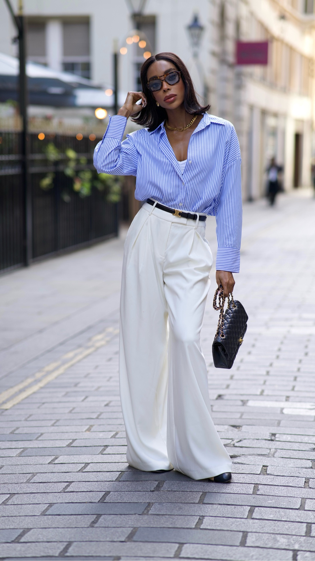 Classic spring look. White trousers. Strip shirt. Céline belt. Chanel bag, Chanel flats. Meshki. ASOS

#LTKworkwear #LTKspring #LTKstyletip