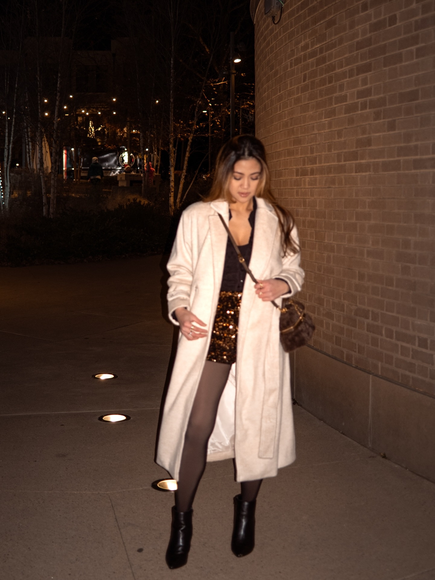 Baby it’s cold outside ✨ featuring this coat from @shop12thtribe 
Wearing the Sinclair Ivory Belted Coat

Bag from Zara

#winteroutfit #wintercoat #coatseason #nyeoutfit 
Winter outfit inspo, New Year’s Eve outfit idea, nye outfit, winter coat, sequin shorts outfit

#LTKootd #LTKSeasonal #LTKPetite