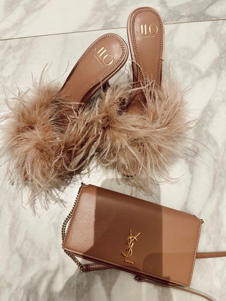 Must have accessories - YSL phone holder and feather heels! 

#LTKparties #LTKitbag #LTKshoecrush
