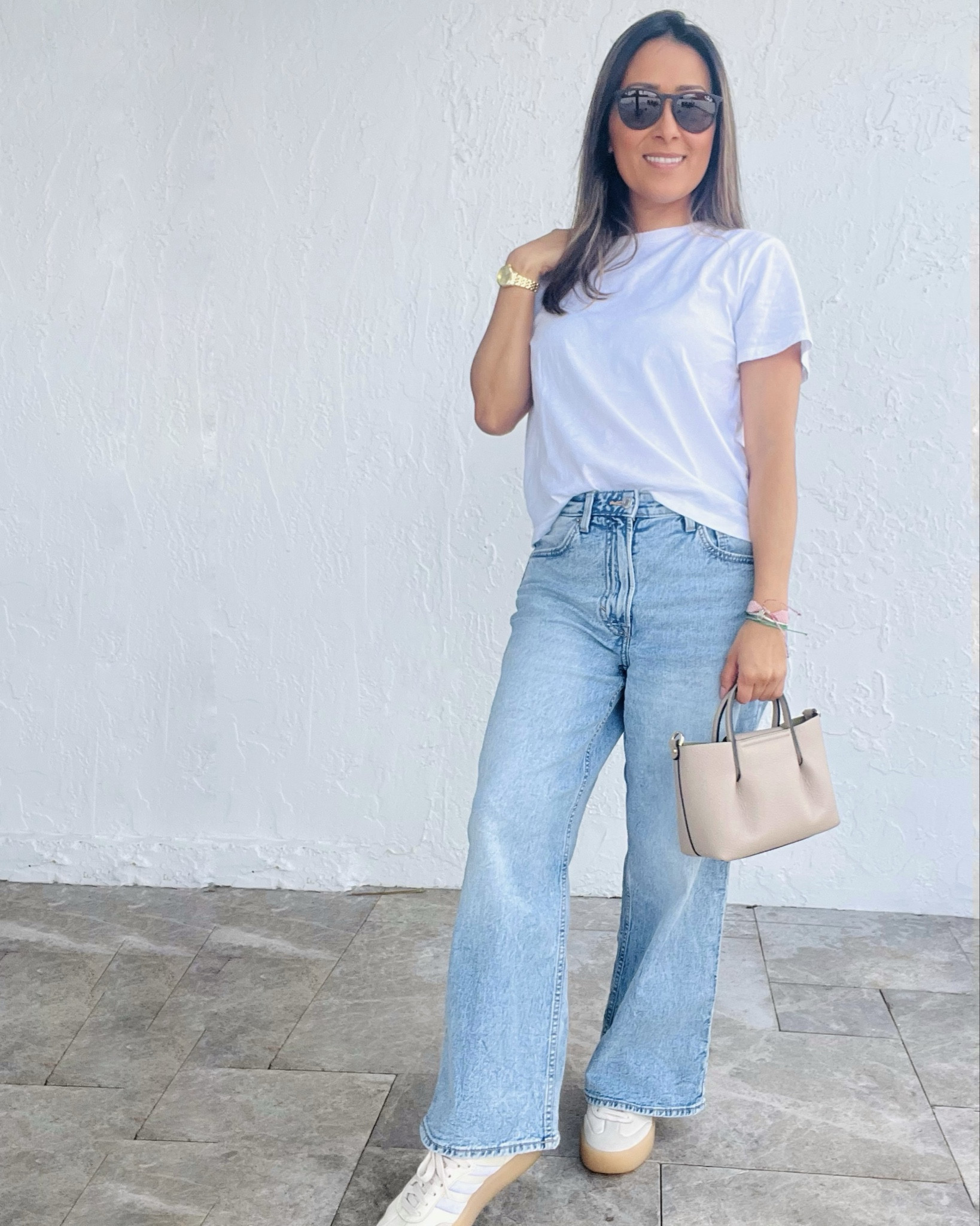 $9 Walmart tee and it’s SO soft 🤍

I’m wearing a size medium for a relaxed fit.
Perfect basic tee to style with jeans and sneakers. 

#LTKmomlife #LTKootd