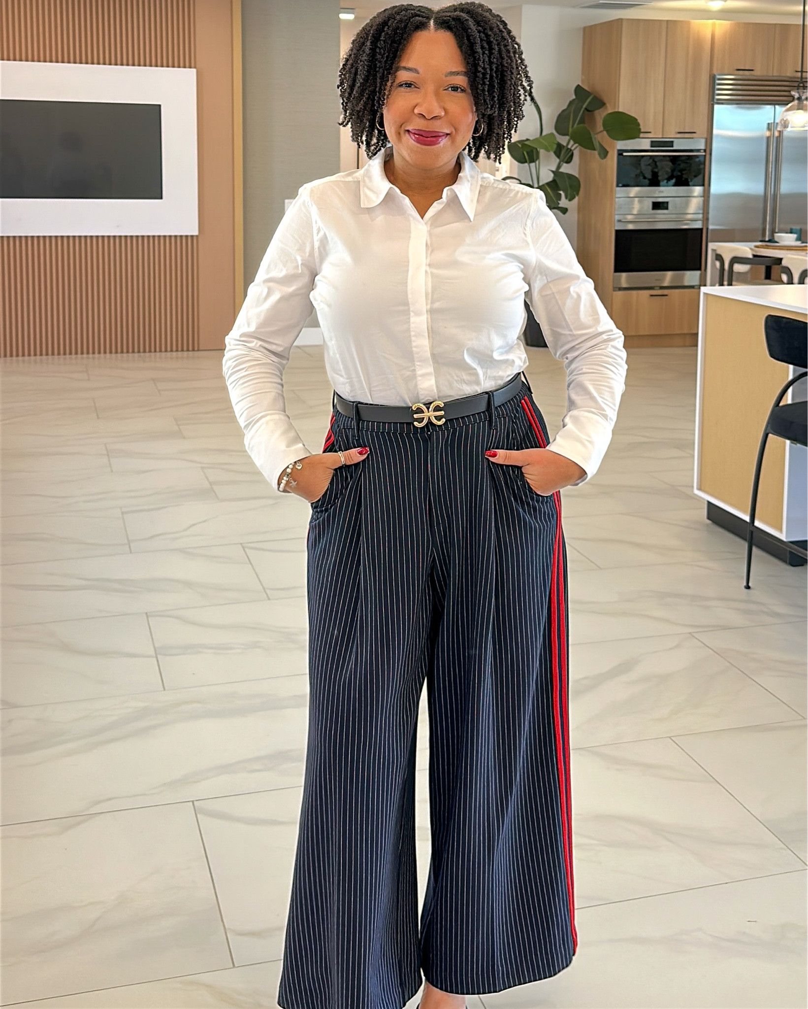 Work outfit. Loving these wide leg pants. The red stripes on the sides are such a nice touch!

#LTKootd #LTKSaleAlert #LTKWorkwear