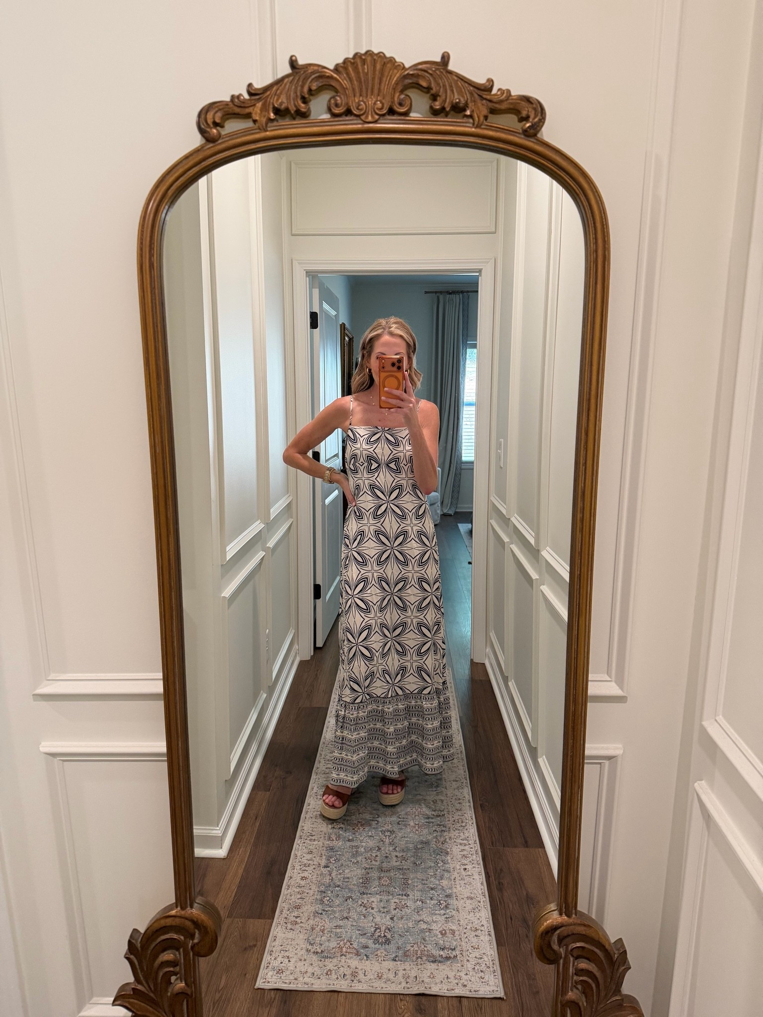 This open back maxi dress from a new day brings classic elegance with a contemporary twist. You can wear a sleeveless during the day or add a fun sweat sweater over the top to be patriotic at night wearing this size small under $30.