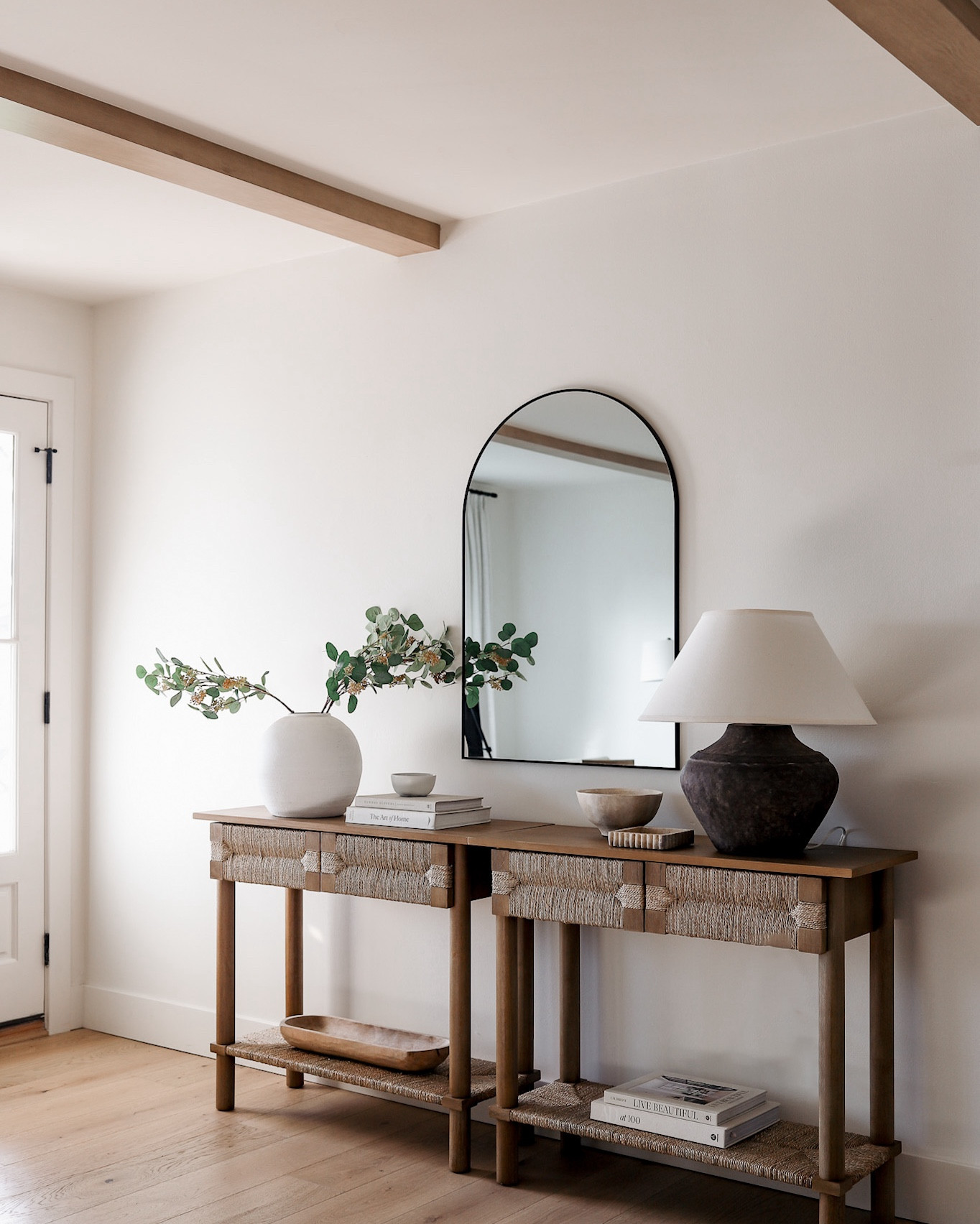 Spring entryway idea 🤍 This console has a gorgeous wire-brushed finish, my favorite! The woven texture is so pretty for the spring and summer months. And those drawers are great for hiding all the things! NOT available on LTK! It’s the  BOHO SEAGRASS & WOOD CONSOLE TABLE from nathanjames.com.

#LTKHome