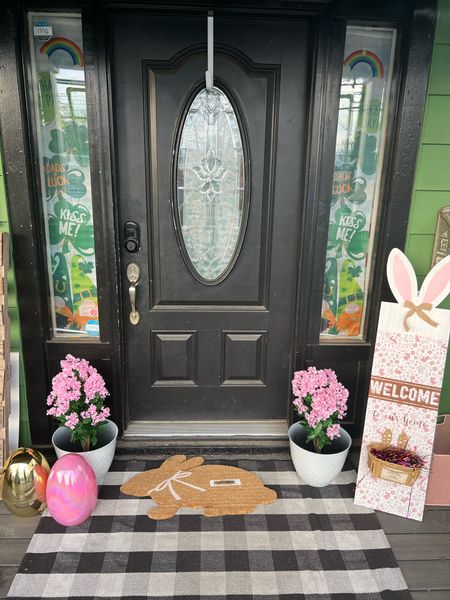Easter Porch -still waiting on my Spring Curtains! Don’t mind my St. Patricks Day banners 🫣🤦🏼‍♀️ in my windows! 

#LTKfindsunder50 #LTKhome #LTKSeasonal