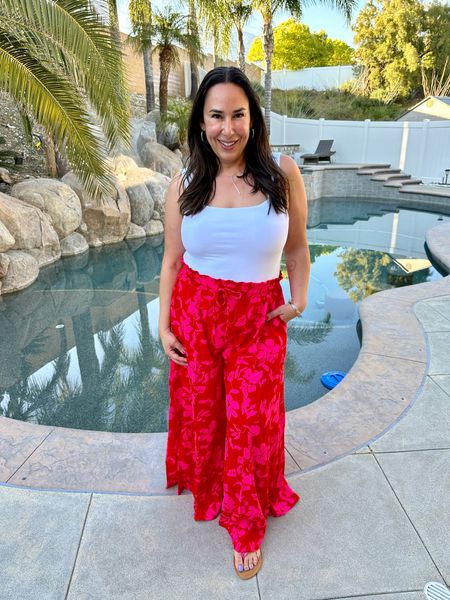 These wide leg trousers are really cute but they're definitely out of my comfort zone. This would be perfect for vacation and resort wear. I'm wearing an XXL in this top and an XL in these pants

#LTKStyleTip #LTKSeasonal #LTKFindsUnder100