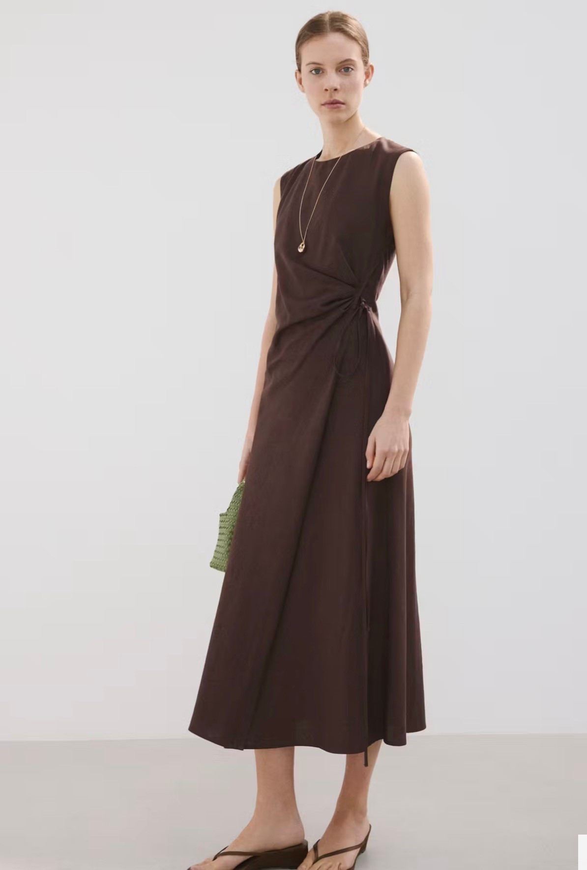 Such a nice brown dress. I like the knot detail on the side. Pair with low wedge shoe 

Mango style 
Spring dress 

#LTKOver40 #LTKSeasonal #LTKPetite