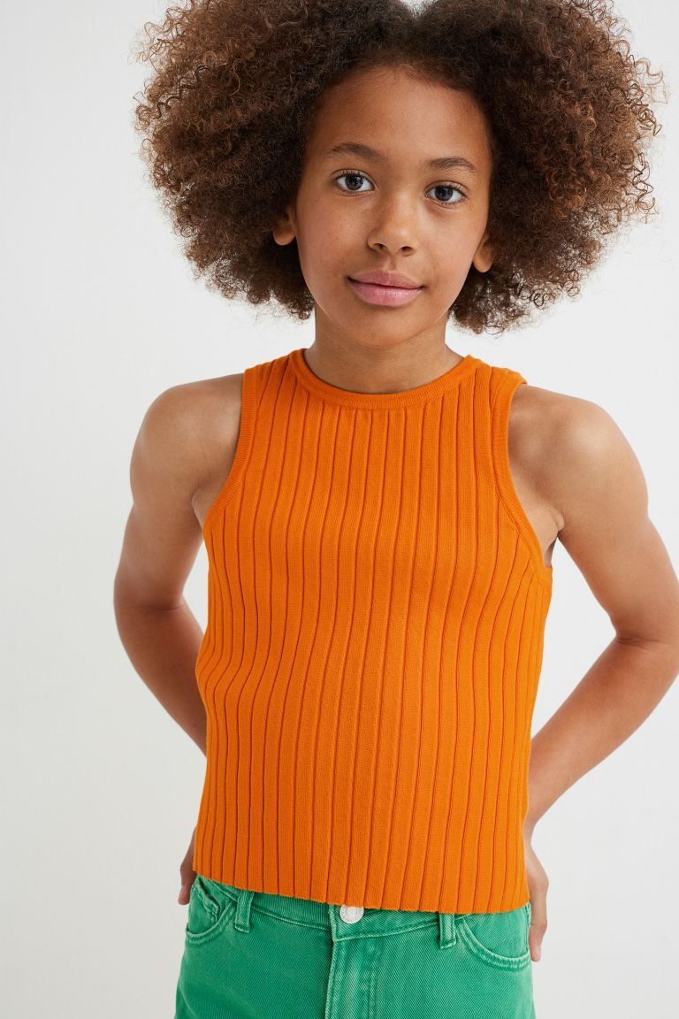 Ribbed top in a fine-knit viscose blend with a round neckline, trim at neckline and armholes, and... | H&M (US)
