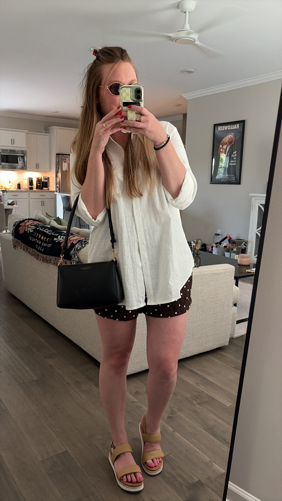 White button down / sized up to a large for an oversized fit 
Brown polka dot shorts / tts wearing a medium 
Platform leather sandals - super comfortable! - tts 
Miu Miu sunglasses 
Black shoulder bag 
Silver bracelet and ring / two tone
Evil eye necklace

#LTKootd #LTKdayinmylife #LTKSaleAlert