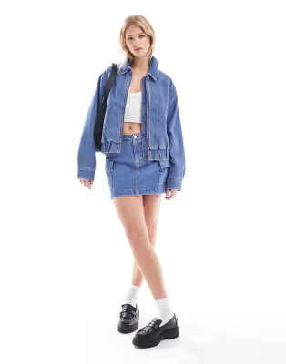 Levi's mini cargo denim skirt in mid blue | ASOS | ASOS (Global)