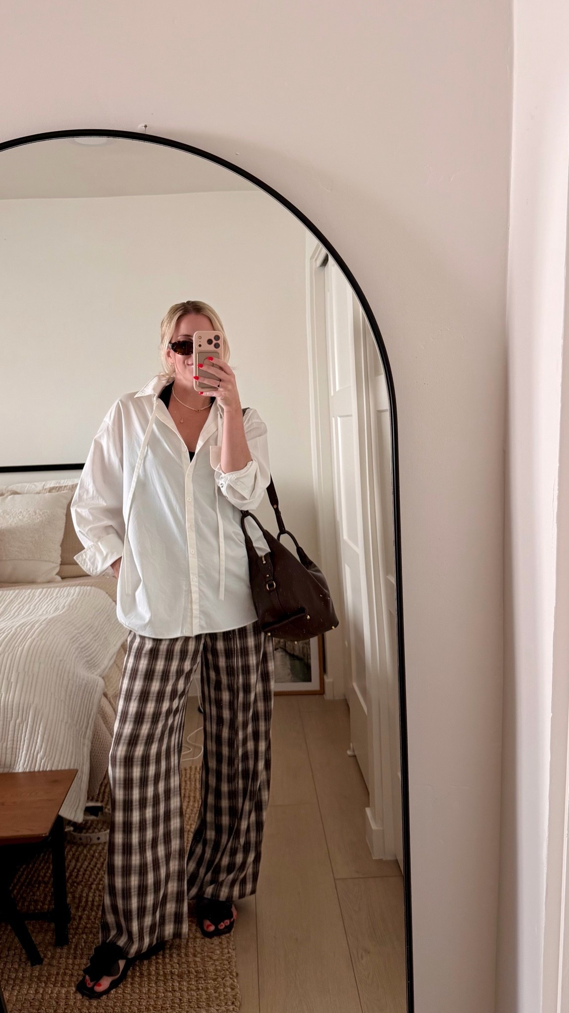 A slow day shopping with my mama 🤎

Wearing head-to-toe Fabrique and officially obsessed with this combination. The oversized white shirt is one of those pieces I know I’ll wear constantly, and these gingham trousers feel equal parts effortless and elevated.

Finished it off with my CIO slouchy bag that has quickly become my everyday favorite ✨

#LTKootd #LTKgrwm #LTKSeasonal