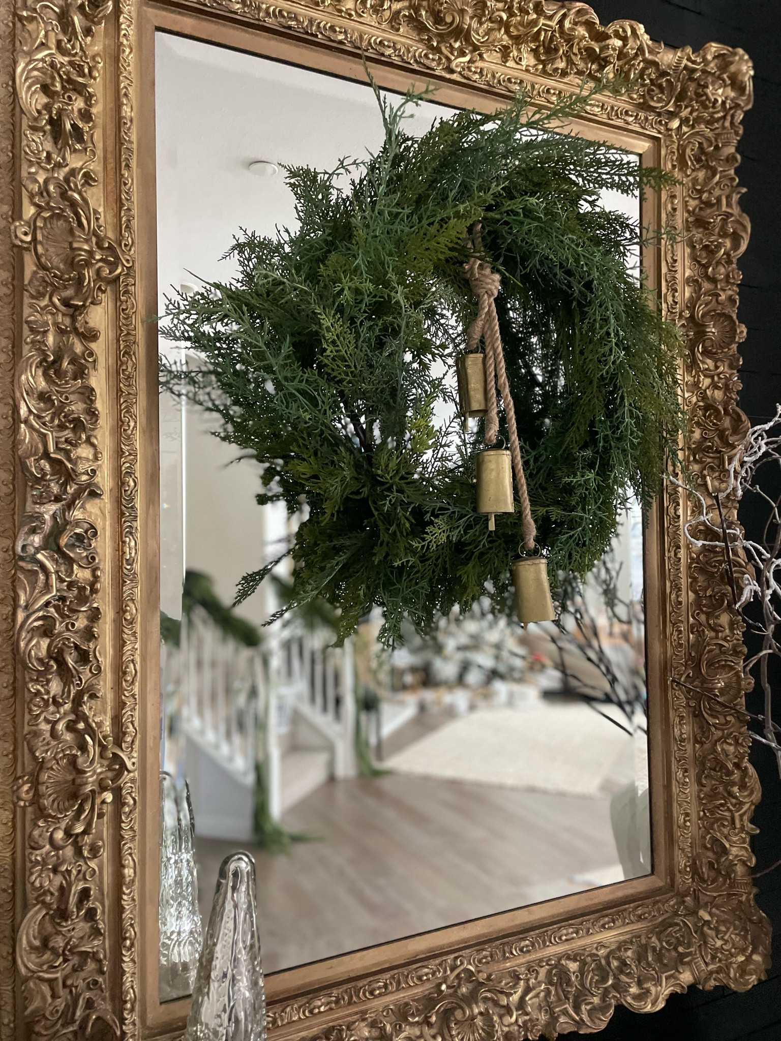 Christmas wreath and bells in our entry way.

Entry way
Mirror
Faux cedar
Gatehouse No. 1 
Christmas decor
Christmas entry 


#LTKSeasonal #LTKhome #LTKHoliday
