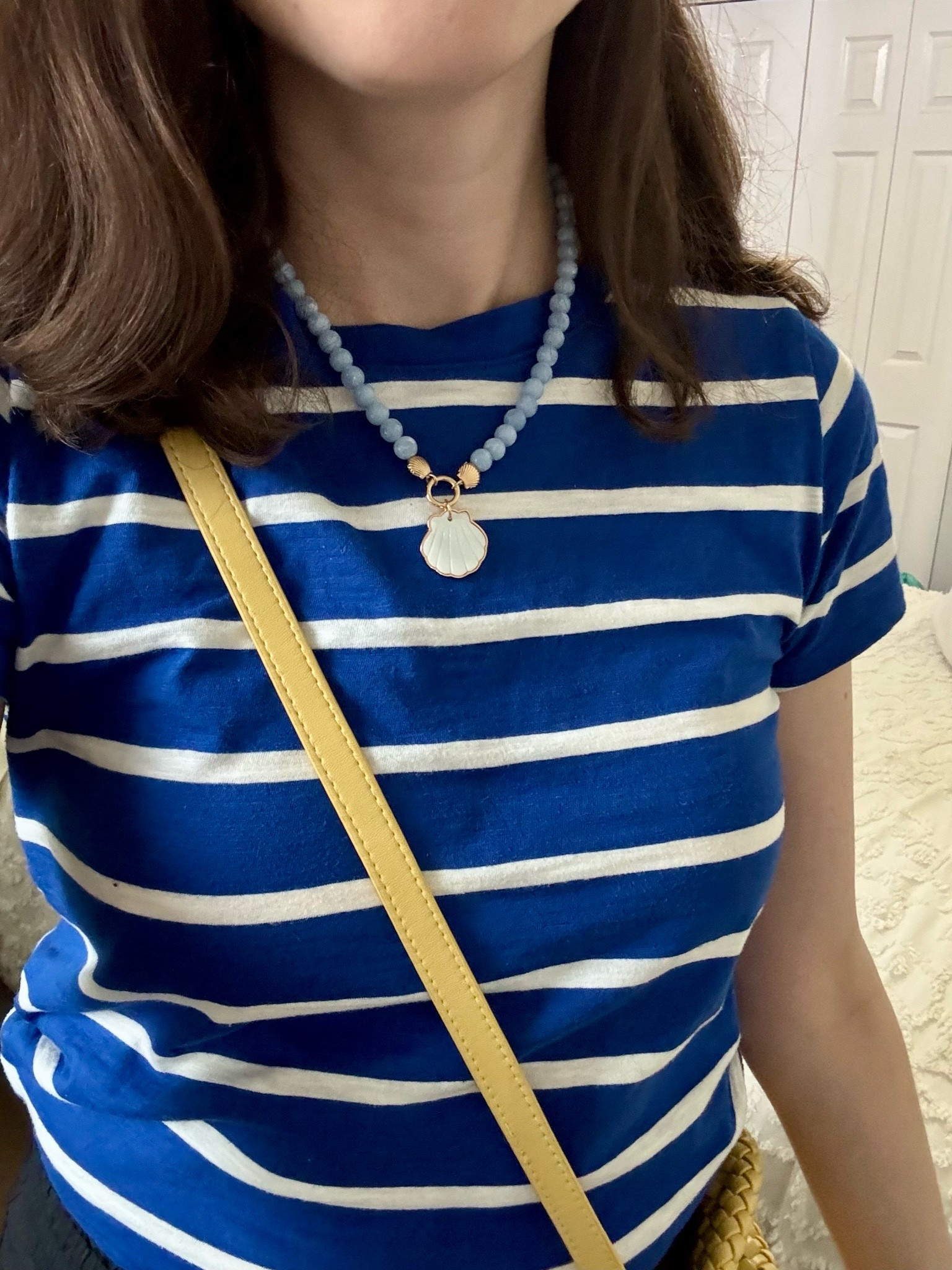 Casual summer outfit 

Shell necklace stripe Tshirt and yellow bag

#LTKootd #LTKSeasonal #LTKSaleAlert