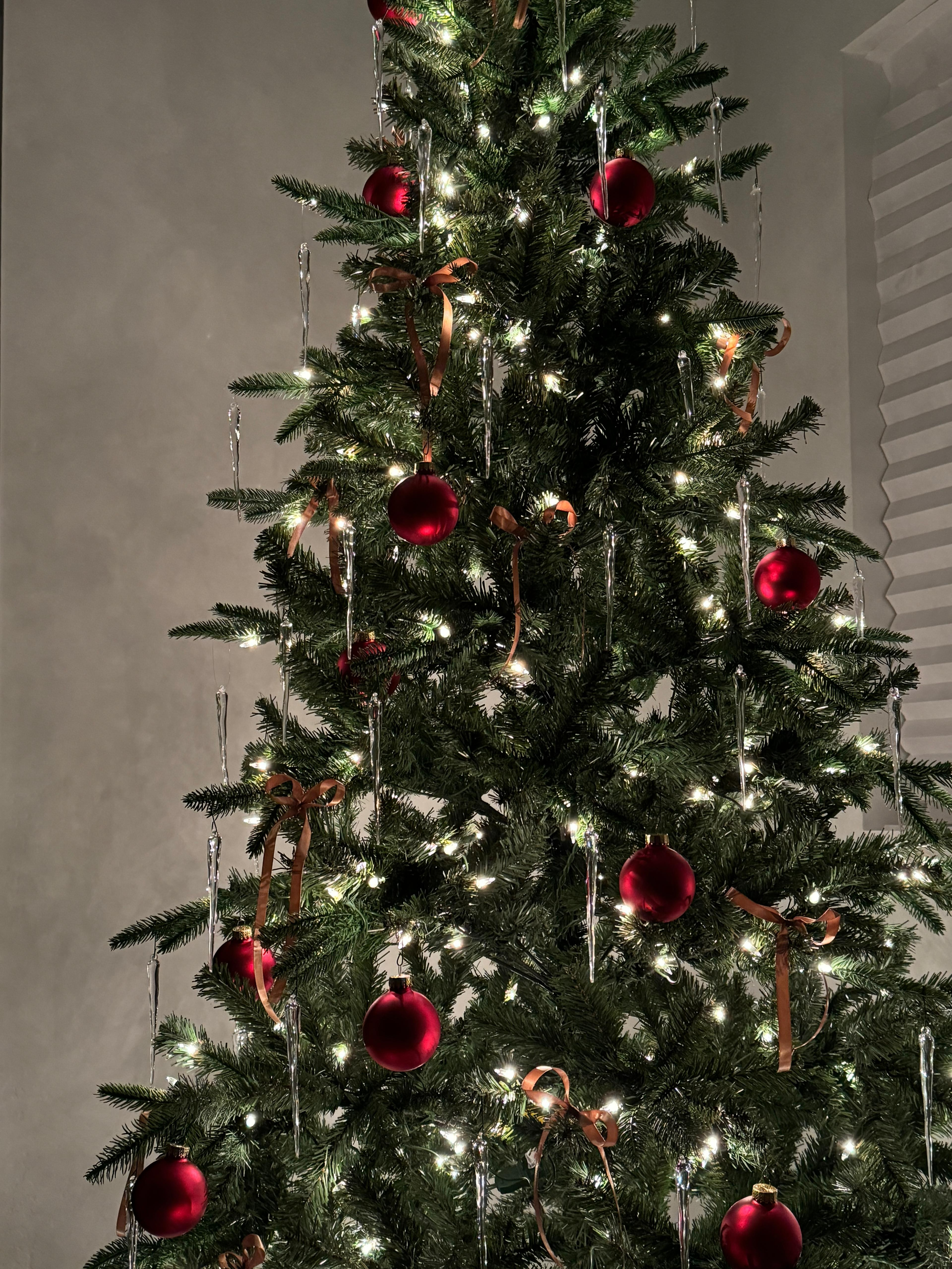 Minimal Christmas tree decor. Cozy christmas tree decor, red ornaments, icicle tree decorated 

 #LTKHoliday #LTKSeasonal #LTKHome