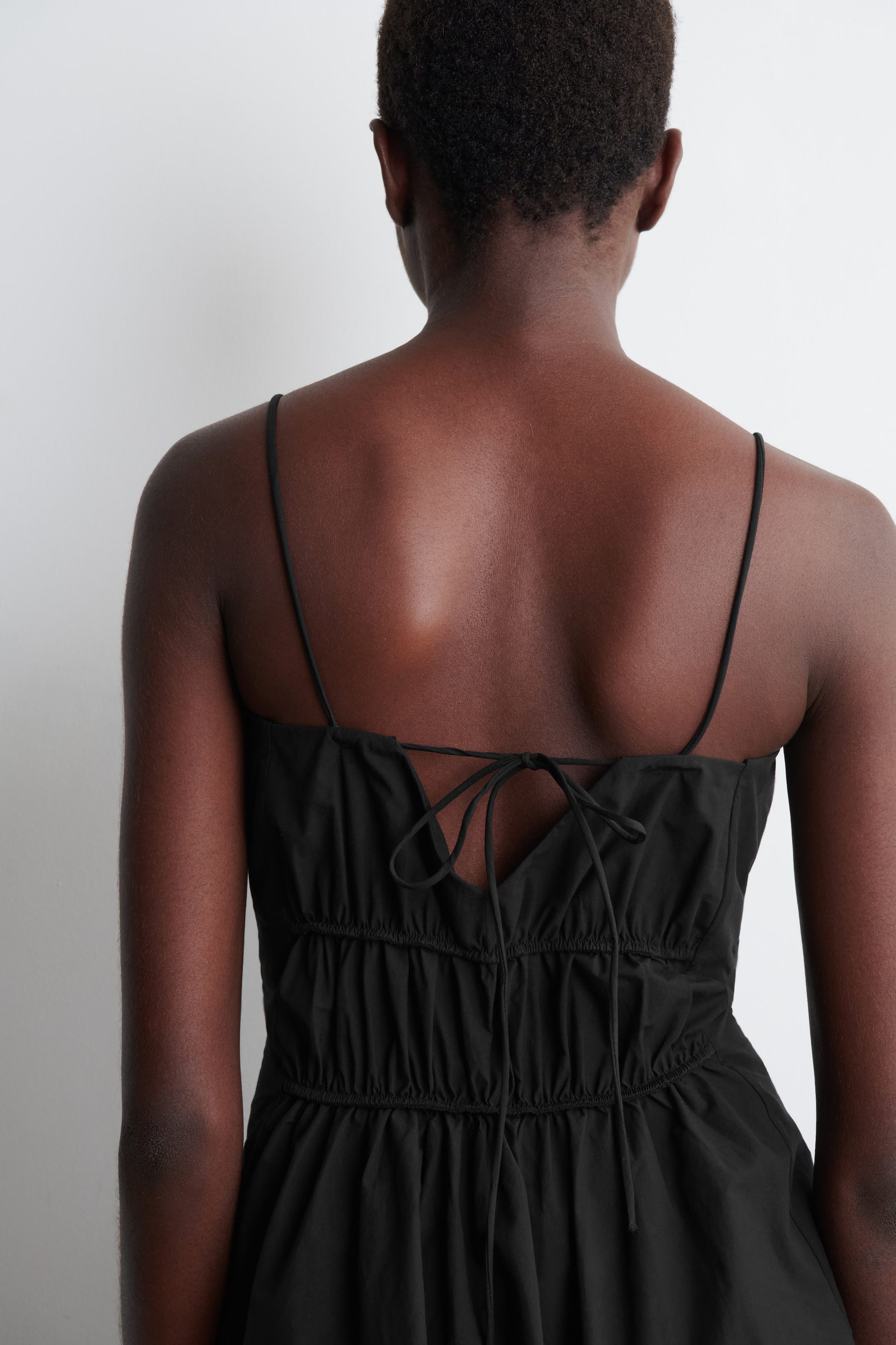 GATHERED COTTON PEPLUM TOP - BLACK | COS US | COS (US)