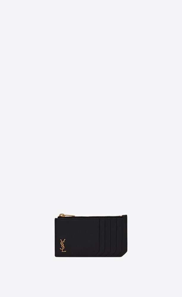 Zippered case with metal YSL initials on the front and card slots on the back. | Saint Laurent Inc. (Global)