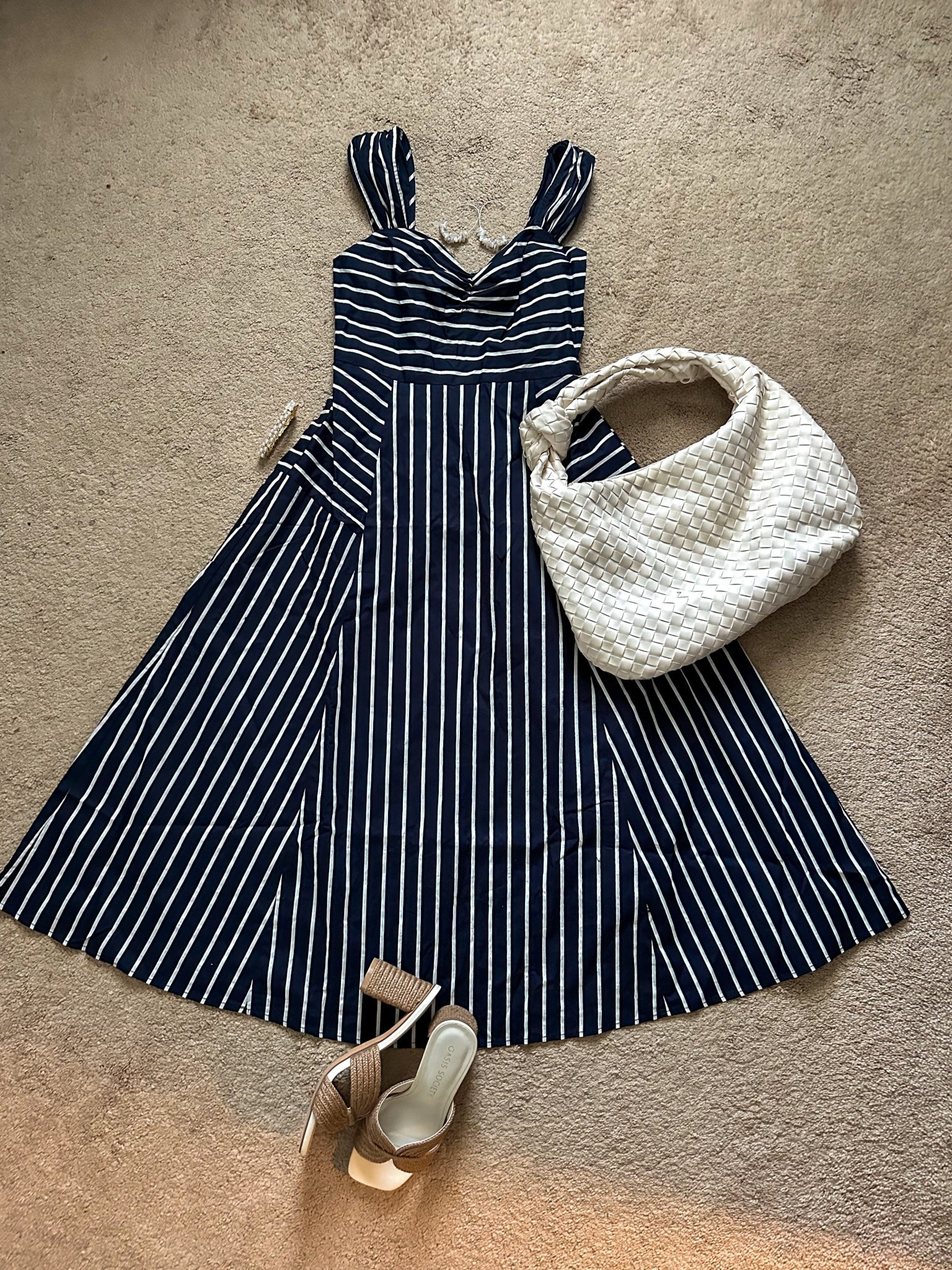 Classic summer style in stripes.
This navy and white fit-and-flare dress is one of those throw-on-and-go pieces that still looks completely pulled together. I paired it with neutral heels and a woven bag for a polished daytime look—perfect for brunch, baby showers, summer travel or summer date night.
Save money with my code Trilbysave30  
Everything is linked on my LTK—including the bag and sandals I’ve been reaching for all season.

#SummerStyle #PetiteFashion #Over40Style #ChicAndEffortless #WhatToWear #NavyDress #WeekendStyle #StyleOver40 #SummerLookbook #ClassicStyle #OOTDDetails #EverydayStyle #EasyOutfits #DressAndDone #LTKFinds #LTKOver40 #LTKPetite #LTKSummer #StyleInspo #OutfitIdeas #GetDressedWithMe #SummerDressStyle #WardrobeGoals #ClosetStaples #LTKStyling

#LTKOver40 #LTKPetite #LTKMidsize