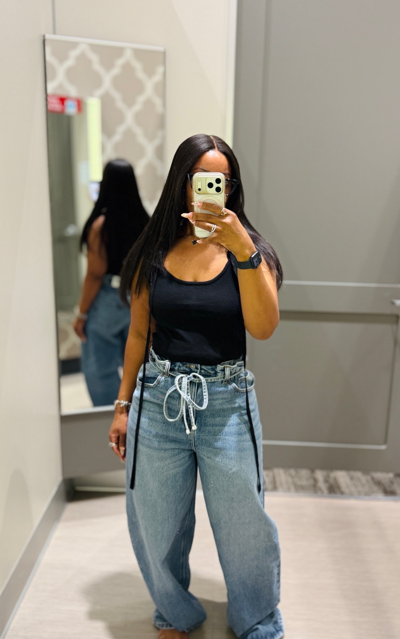 I am wearing a size 6 in these paper bag high waisted jeans. They run baggy but I love the details. Depending on your waist, you could size down. I did tuck the tank top in to show the details of the jeans more.

#LTKPetite #LTKU #LTKootd
